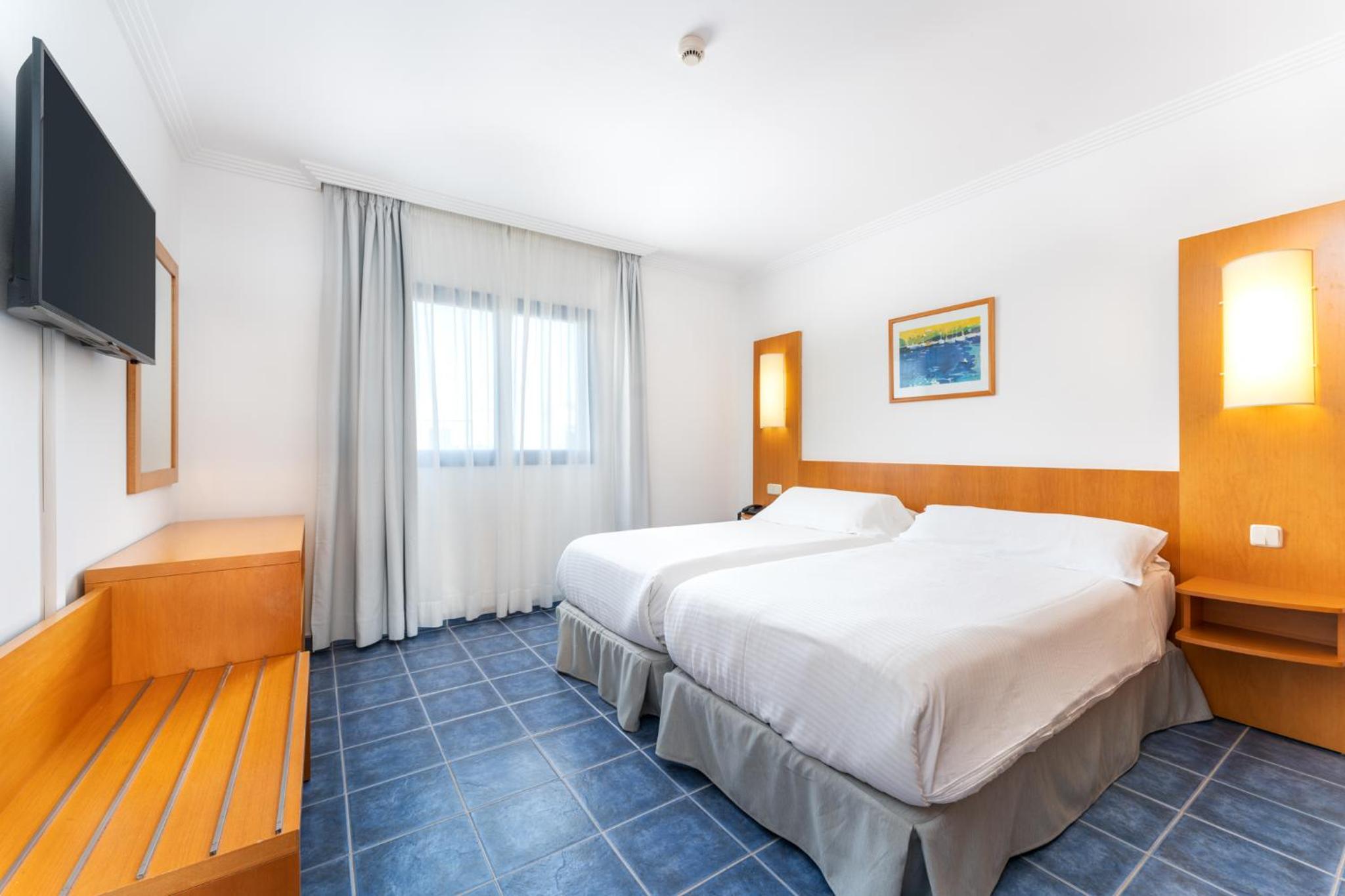 Habitación familiar (2 adultos + 1 niño)