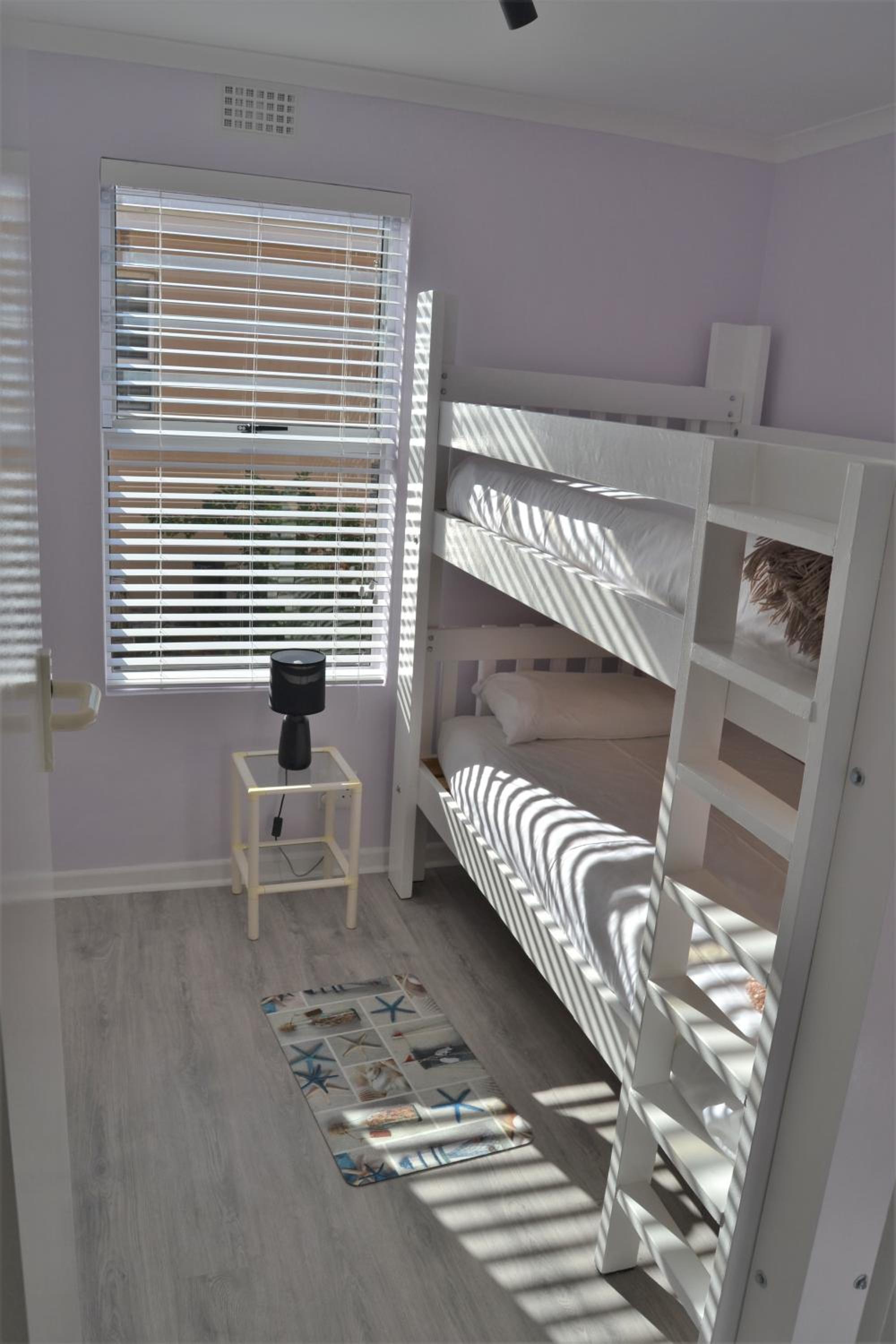 Three-Bedroom House - Photo 18