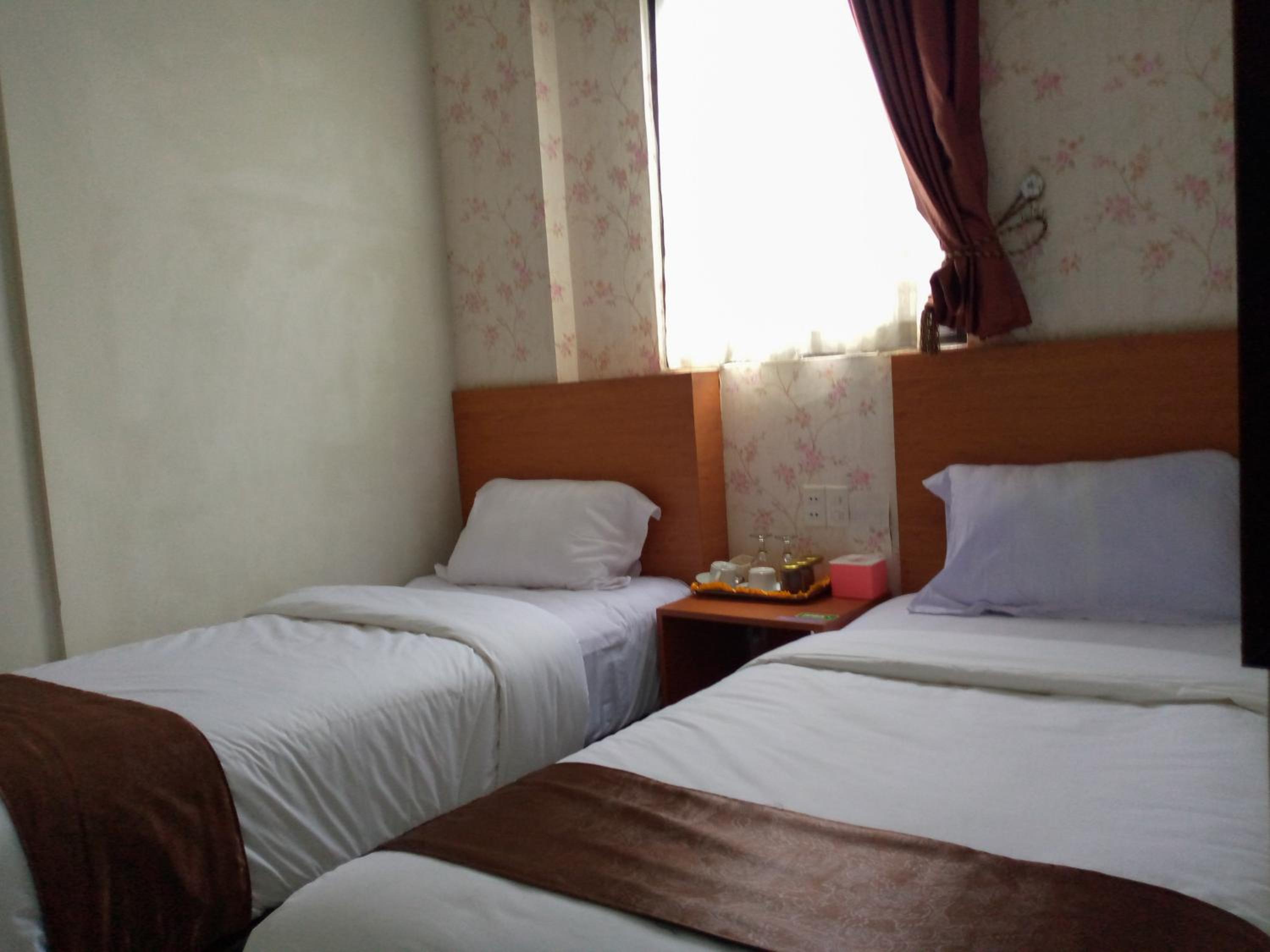Twin Room - Photo 7