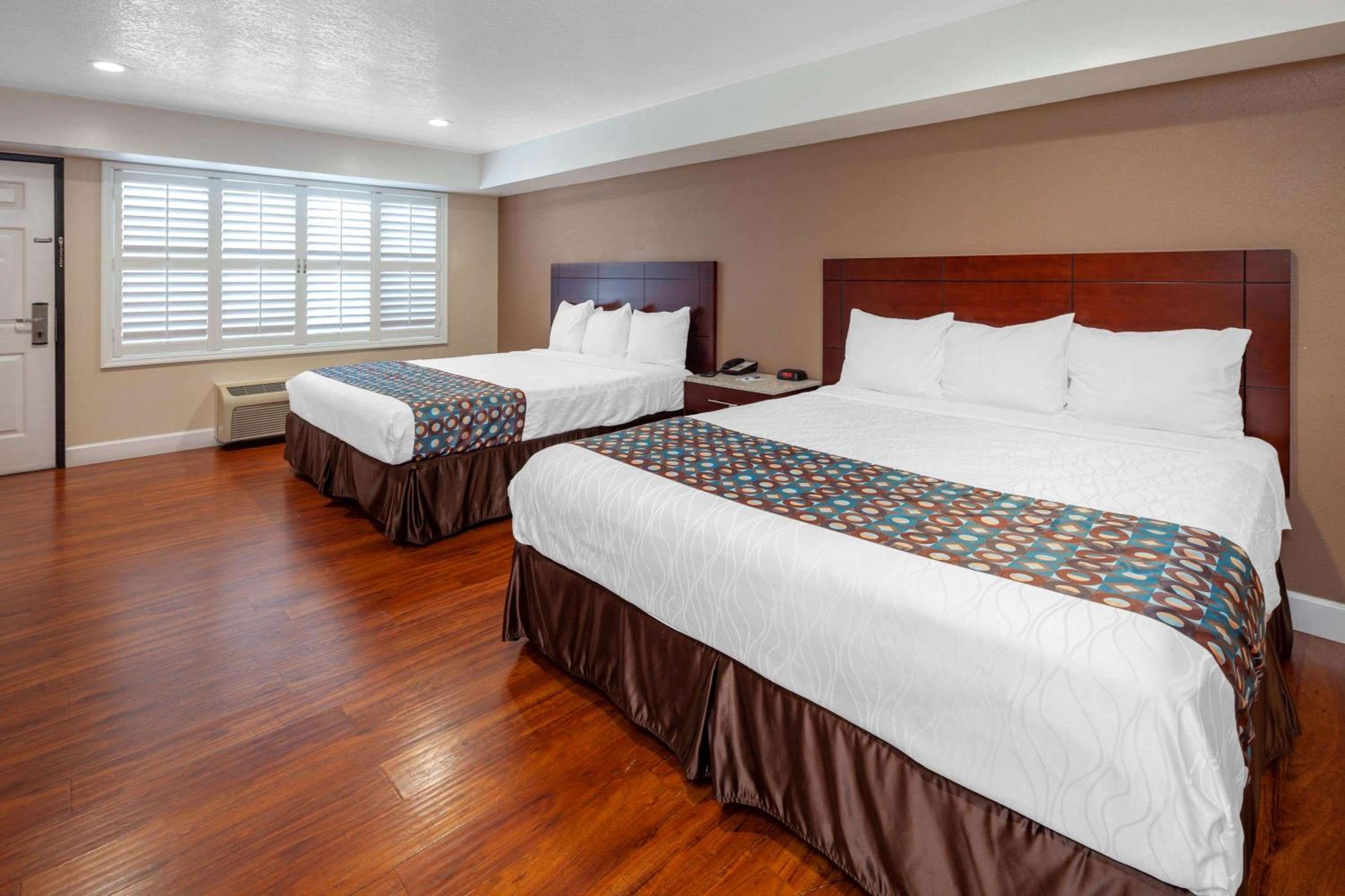 King Room with Two King Beds - Non-Smoking photo 1