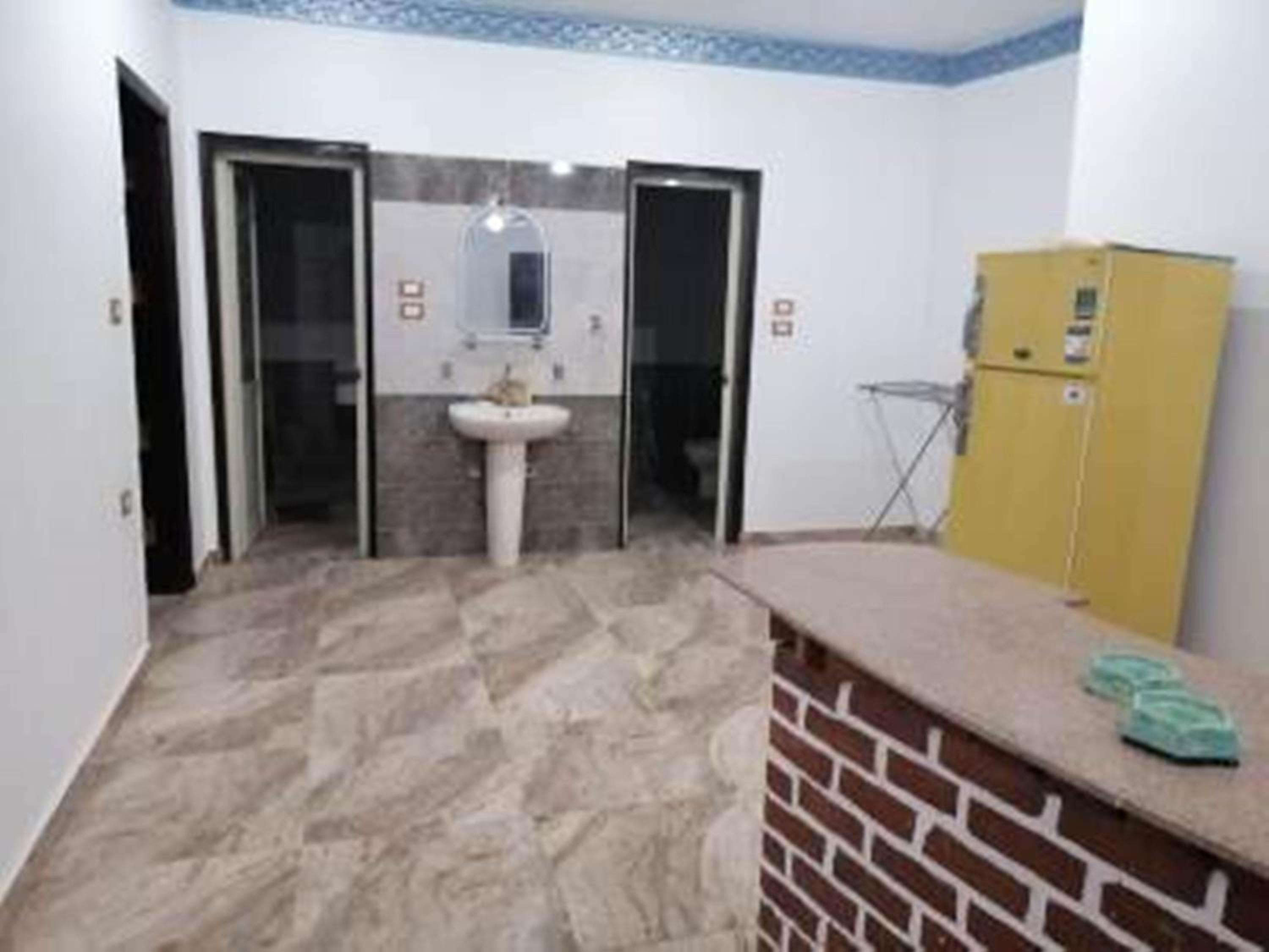Two-Bedroom Apartment - Photo 35