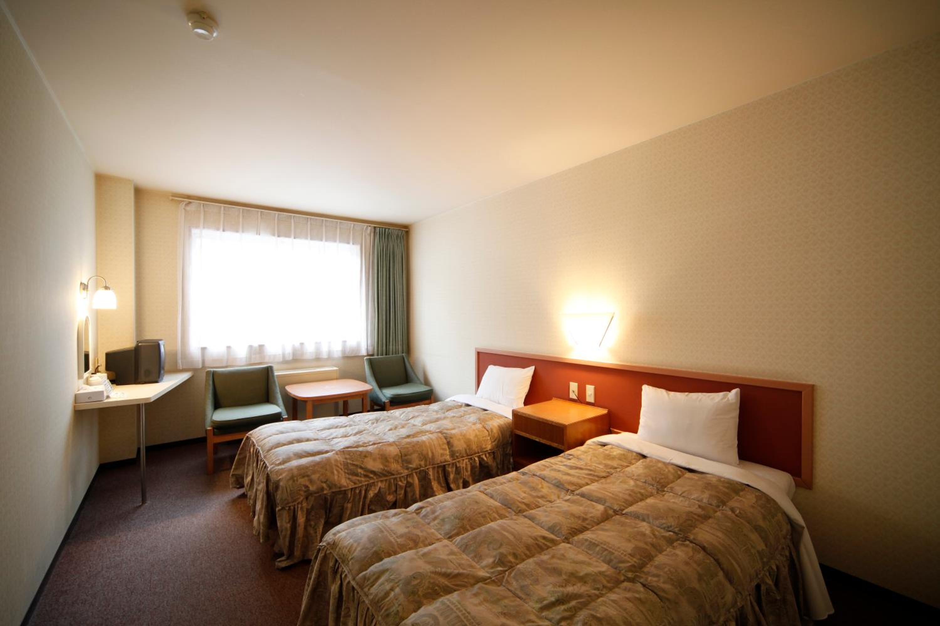 Twin Room - Non-Smoking - Photo 9
