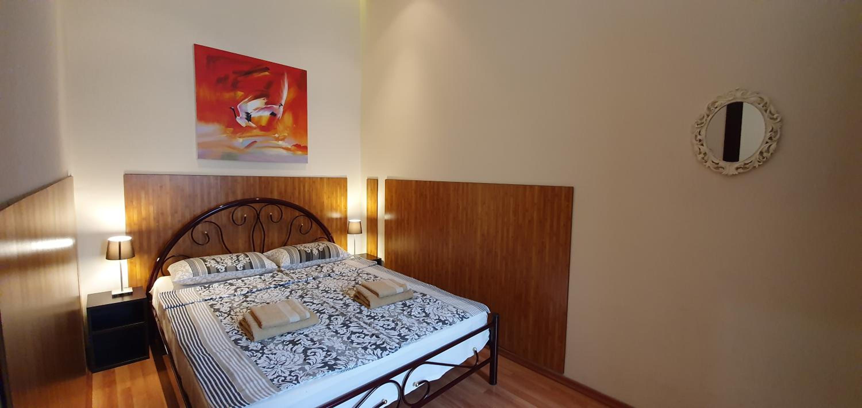 One-Bedroom Apartment with Balcony and City View - Photo 1