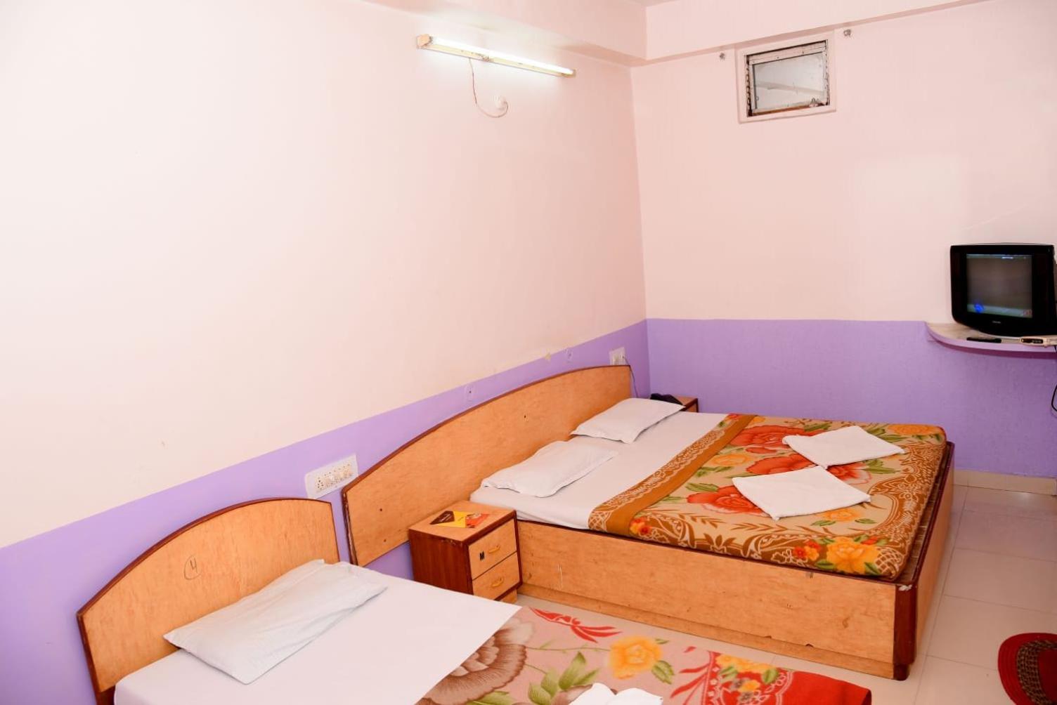Deluxe Triple Room - Photo 7