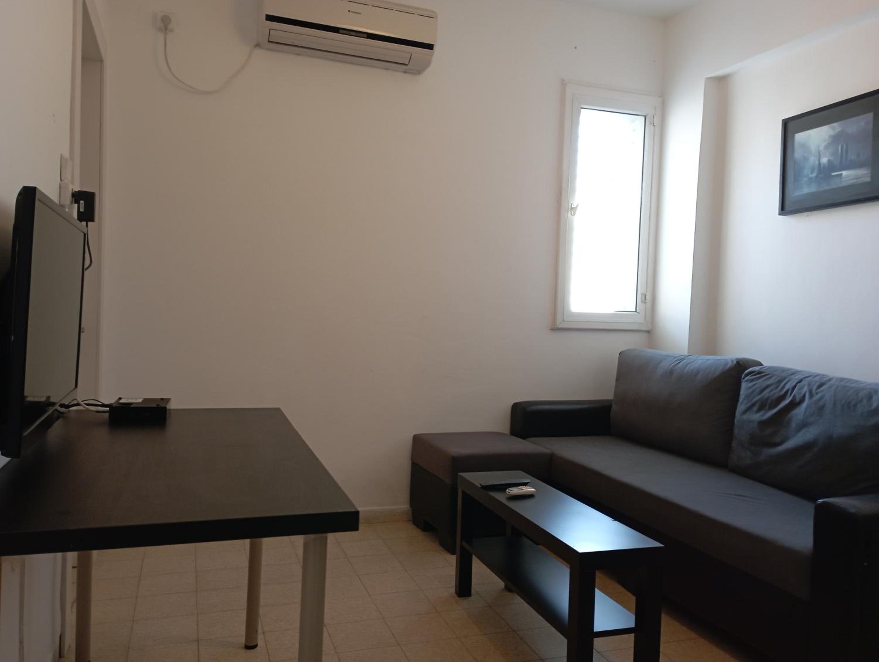 Three-Bedroom Apartment photo 2