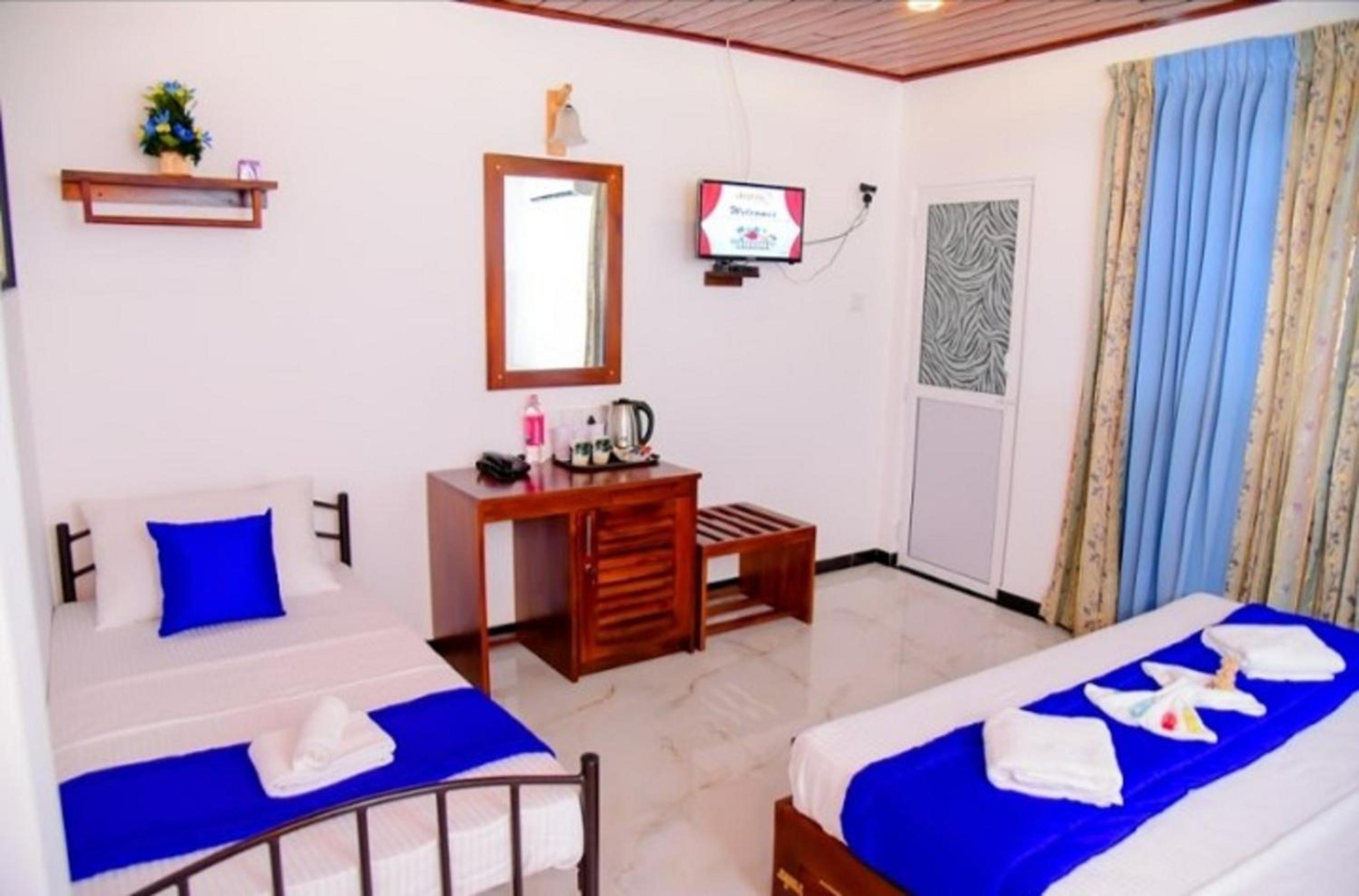 Deluxe Triple Room - Photo 3