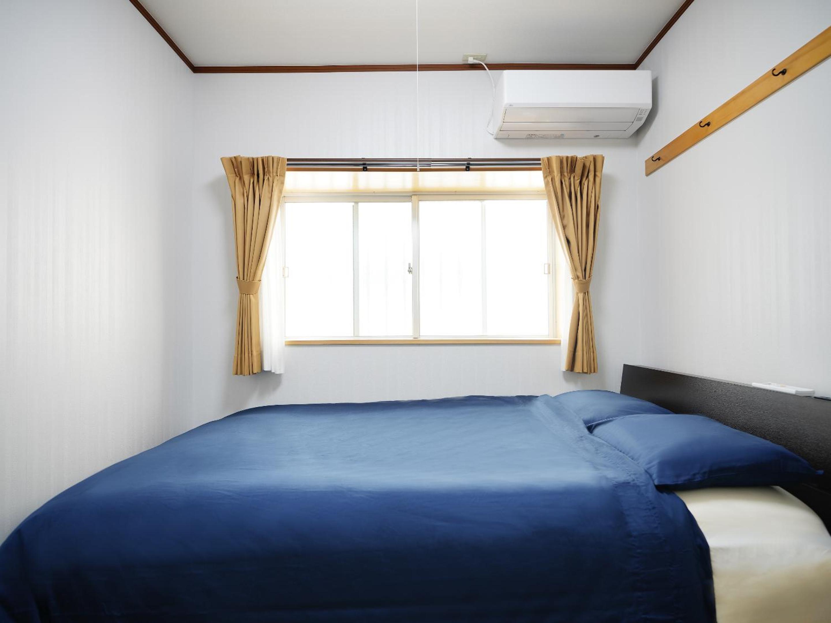 Three-Bedroom Apartment - Photo 14