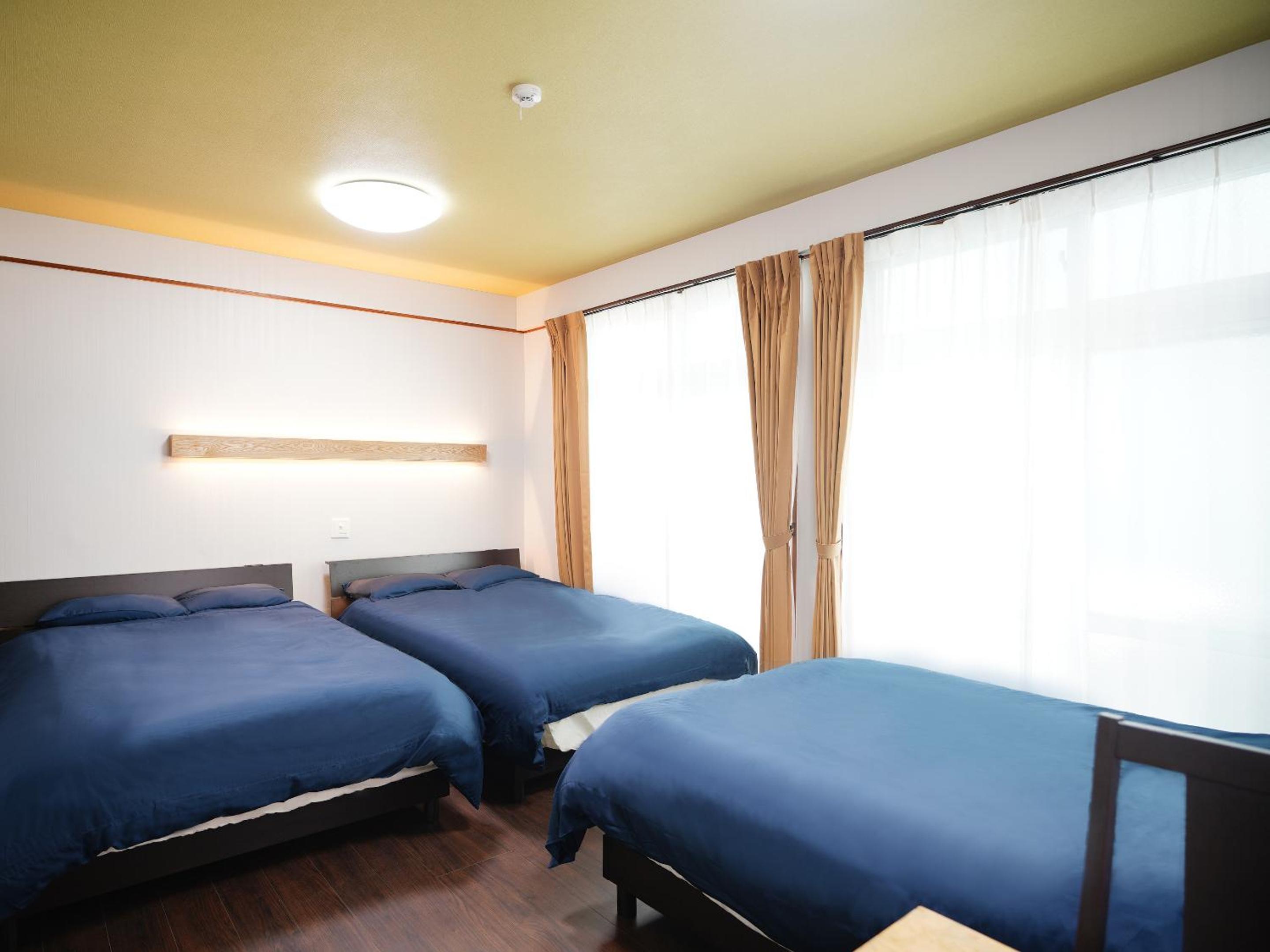 Three-Bedroom Apartment - Photo 1