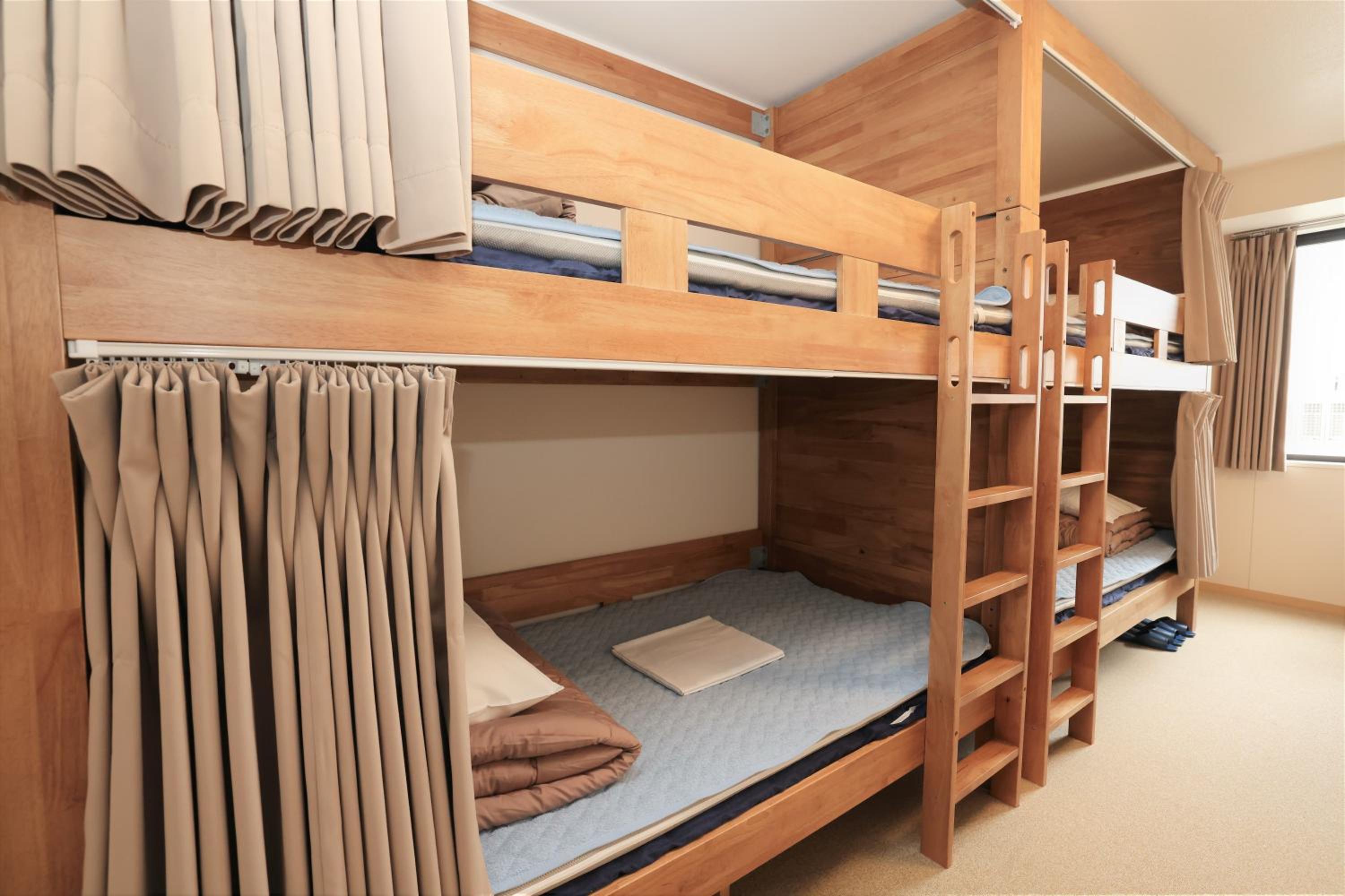 Quadruple Room with Private Bathroom and Toilet - Non-Smoking photo 1