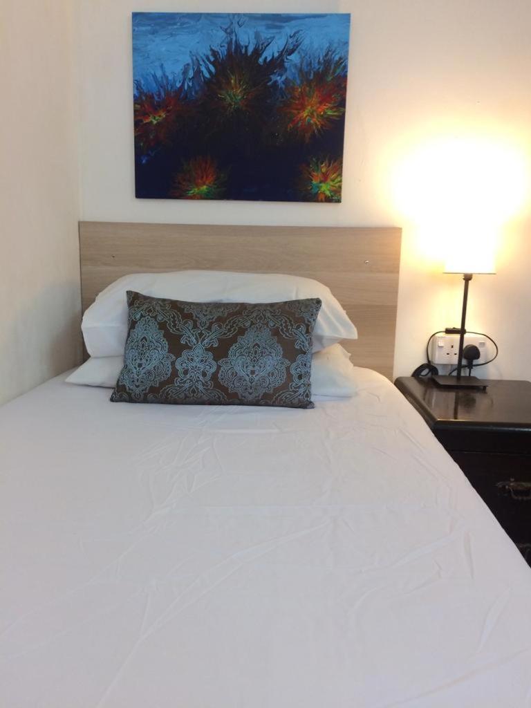 Single Room with Shared Shower and Toilet