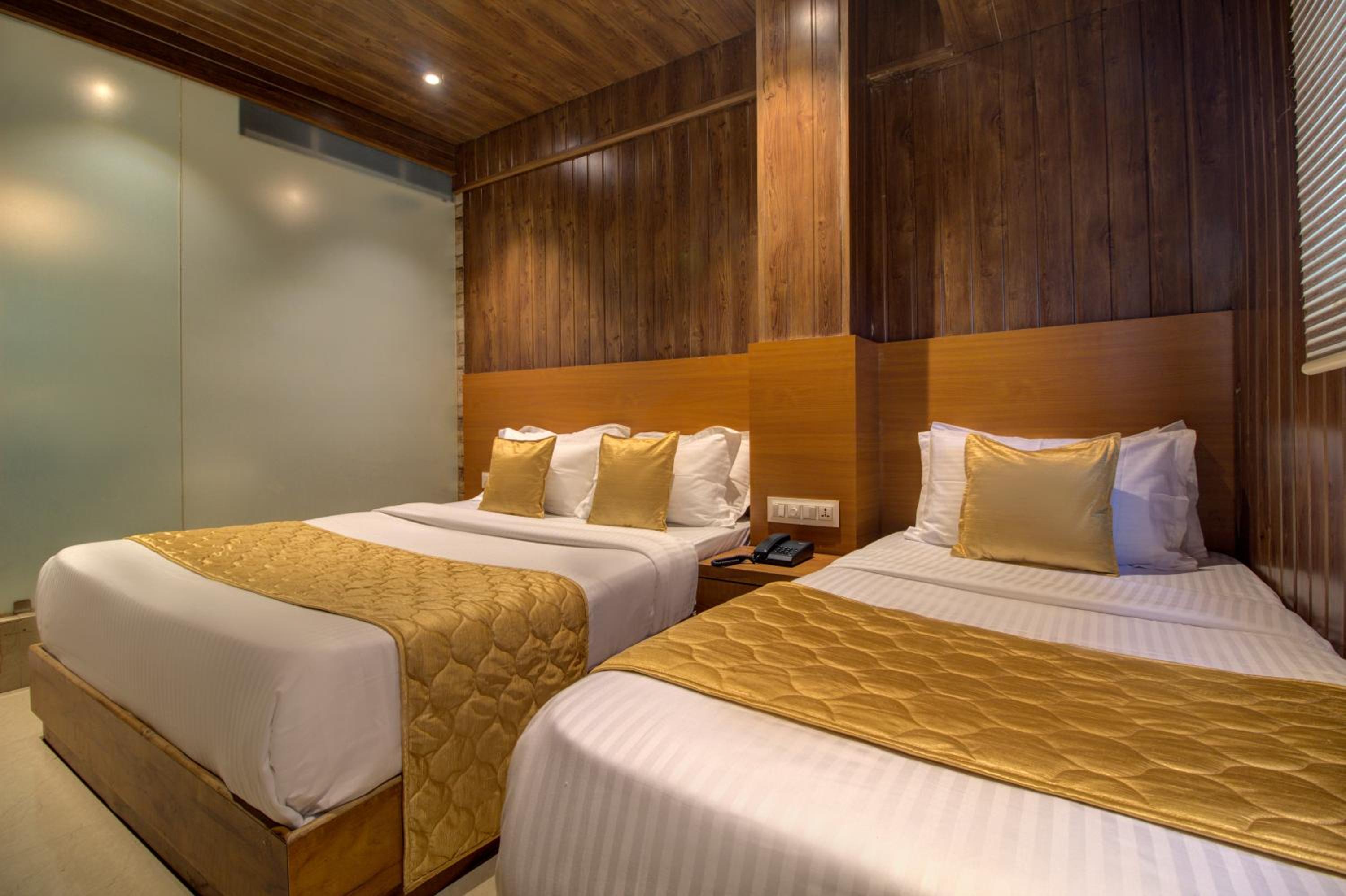 Deluxe Triple Room - Photo 9