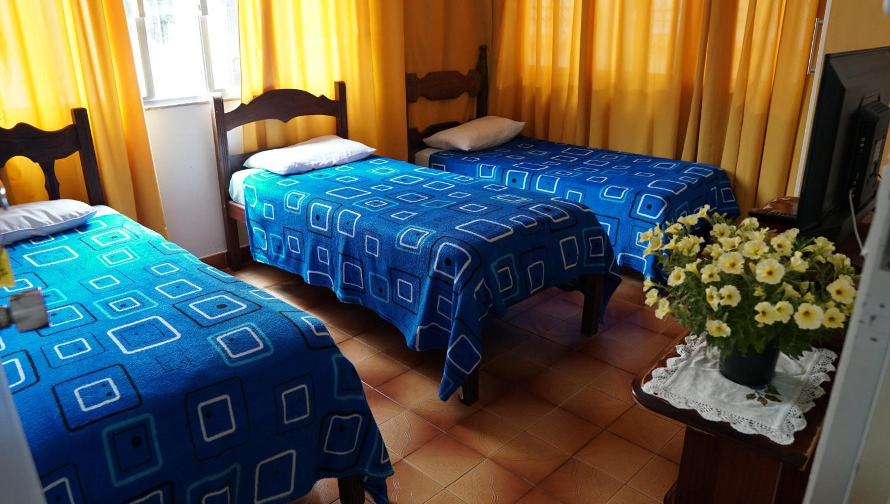 Basic Triple Room With Shared Bathroom