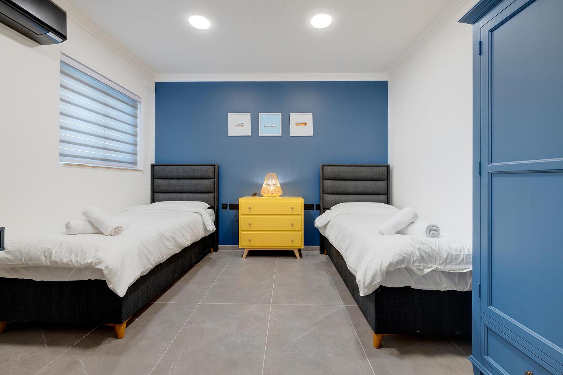 Three-Bedroom Apartment - Photo 23