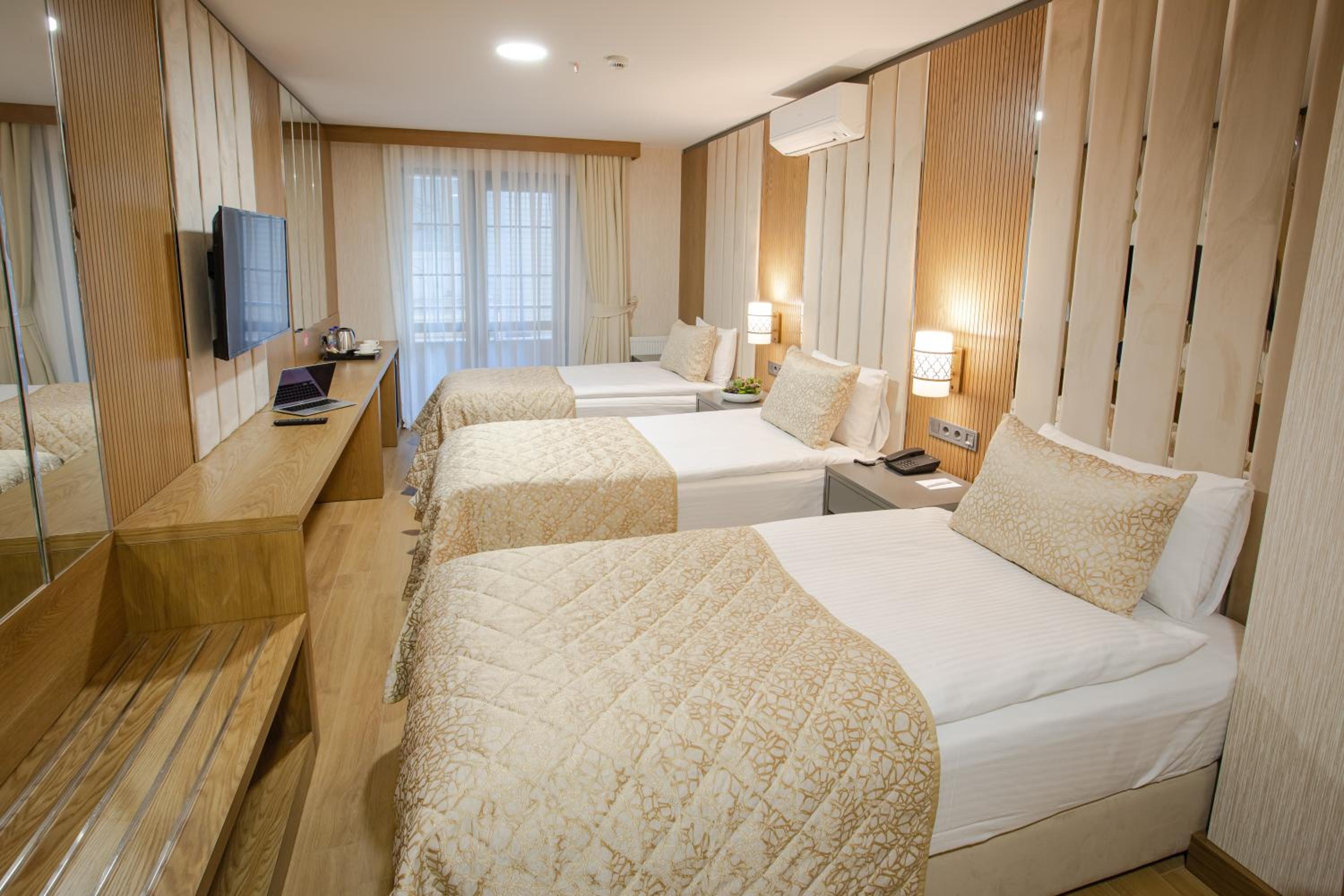 Standard Triple Room - Photo 1