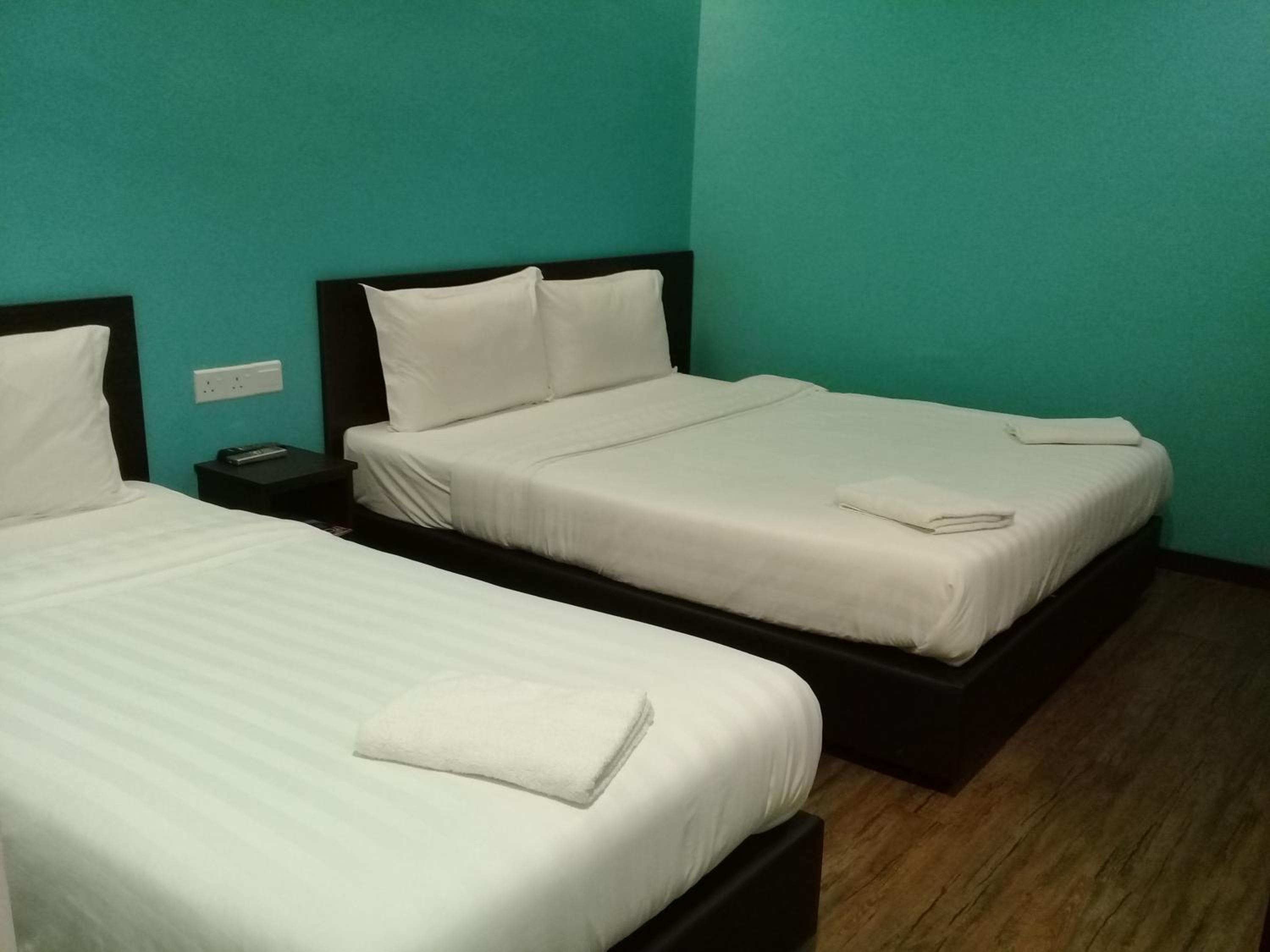 Deluxe Triple Room - Photo 1