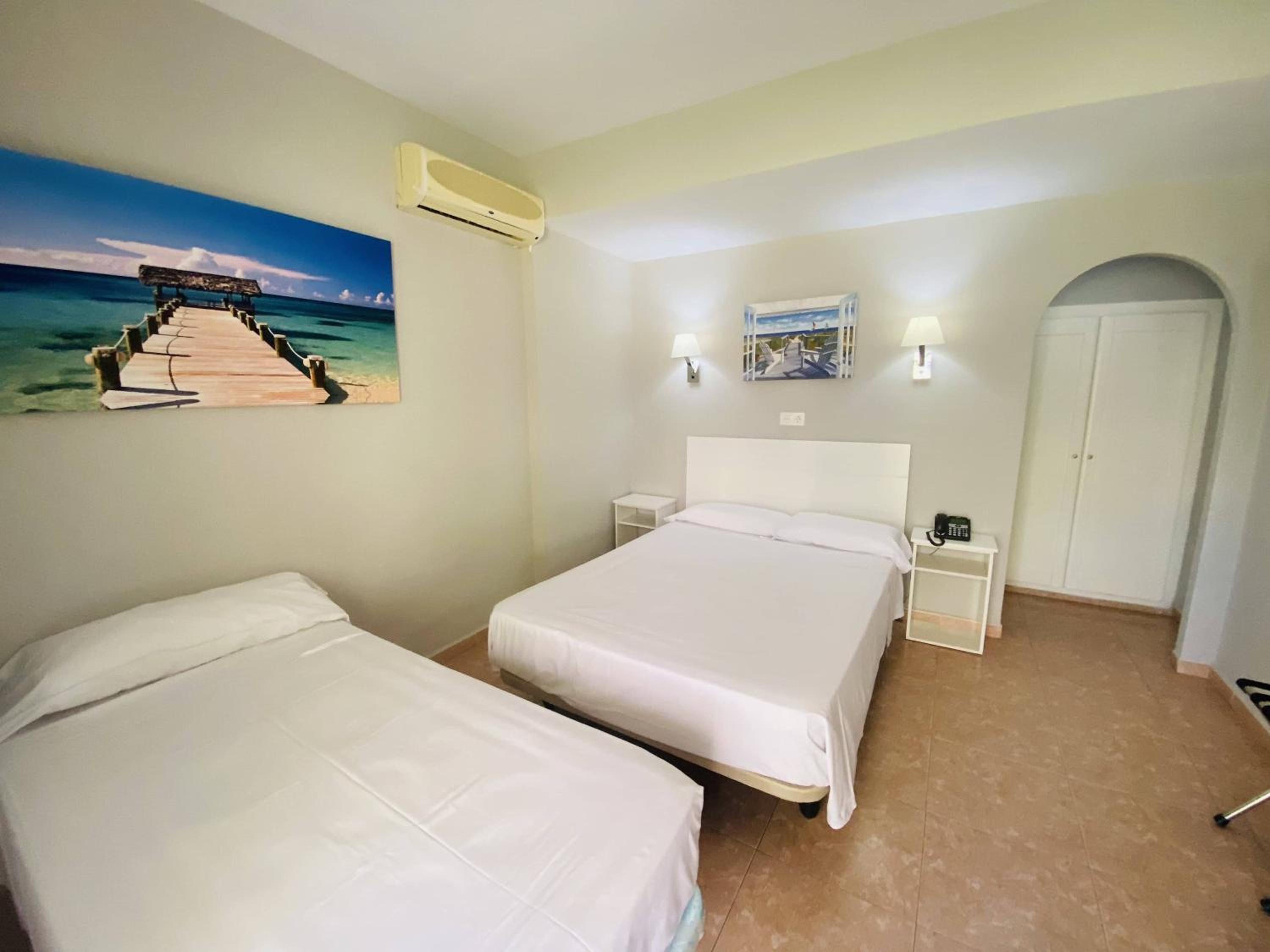 Habitación Doble con Cama Extra - Planta Baja