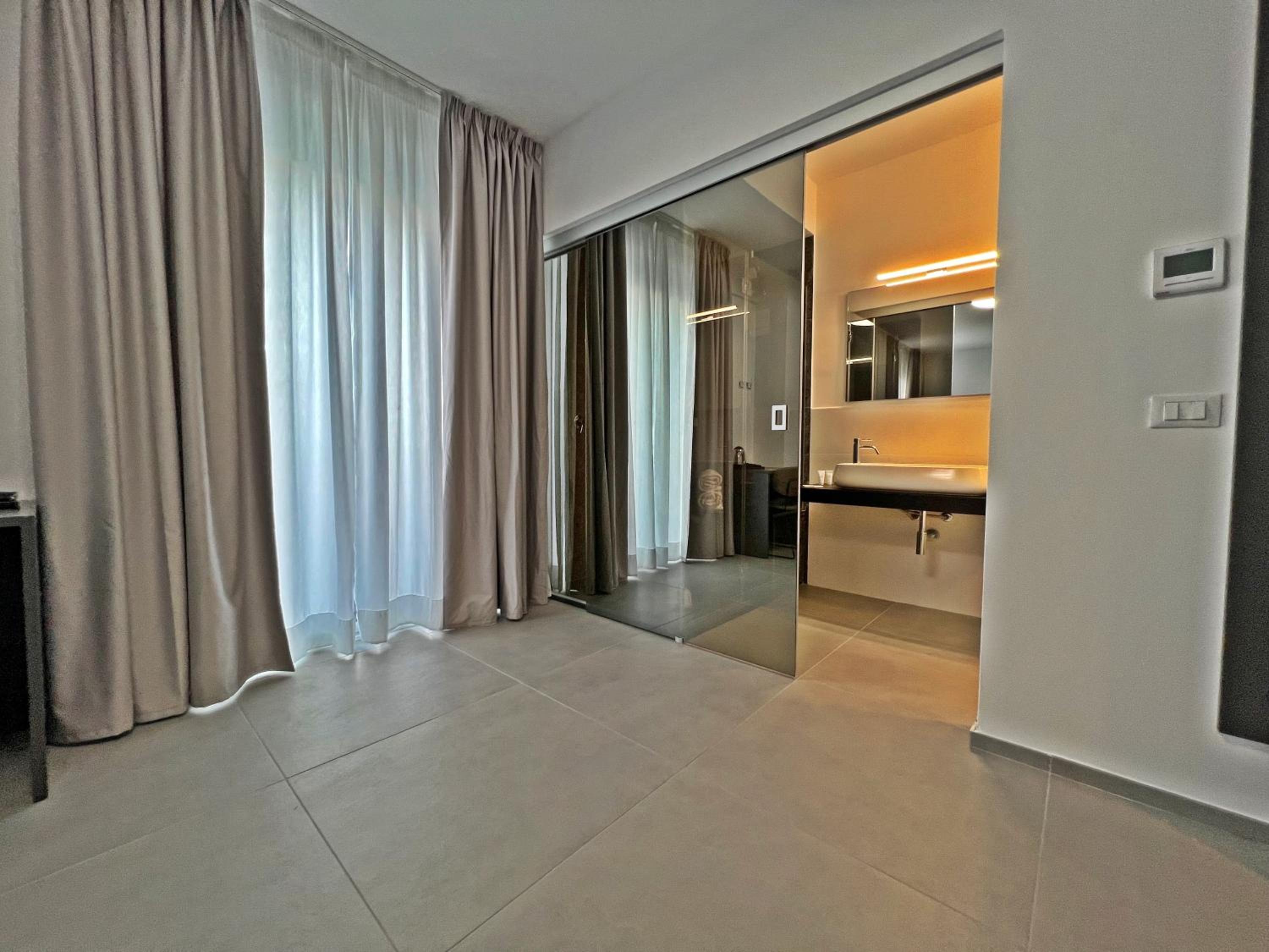 Family Junior Suite with Terrace and Sea View - Photo 22