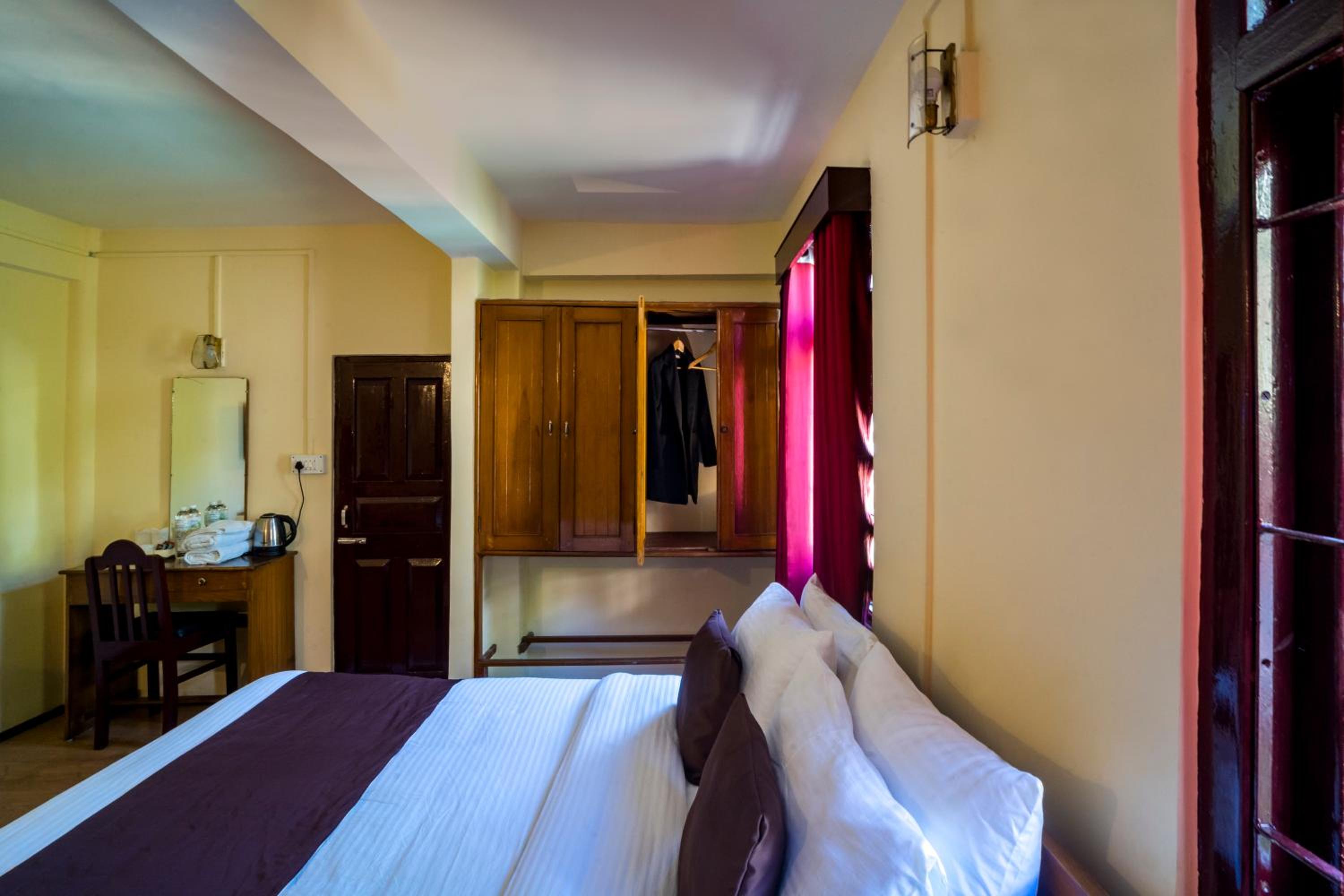 Deluxe Room - Photo 25