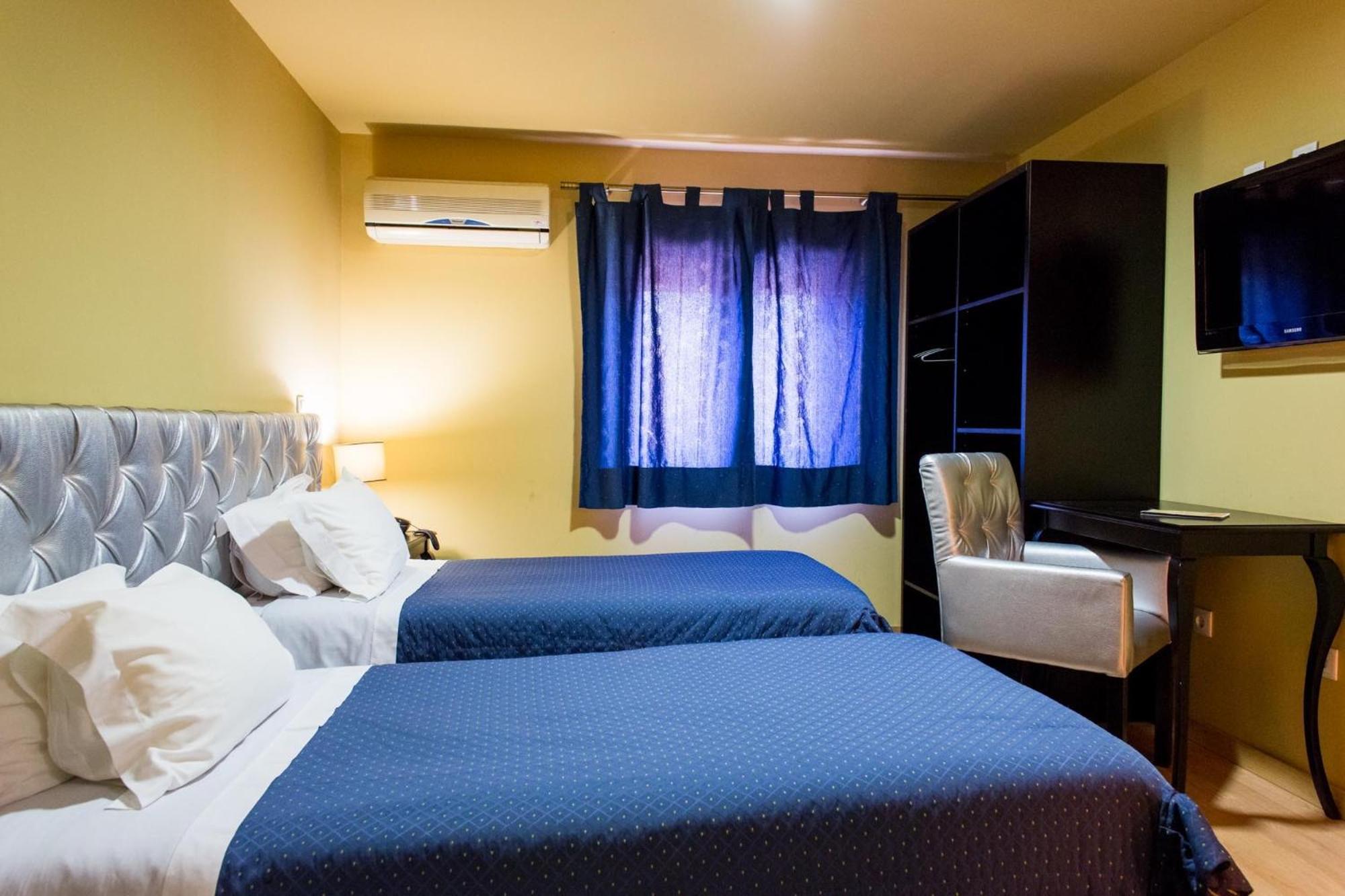 Triple Room (1 Double Bed + 1 Single Bed)