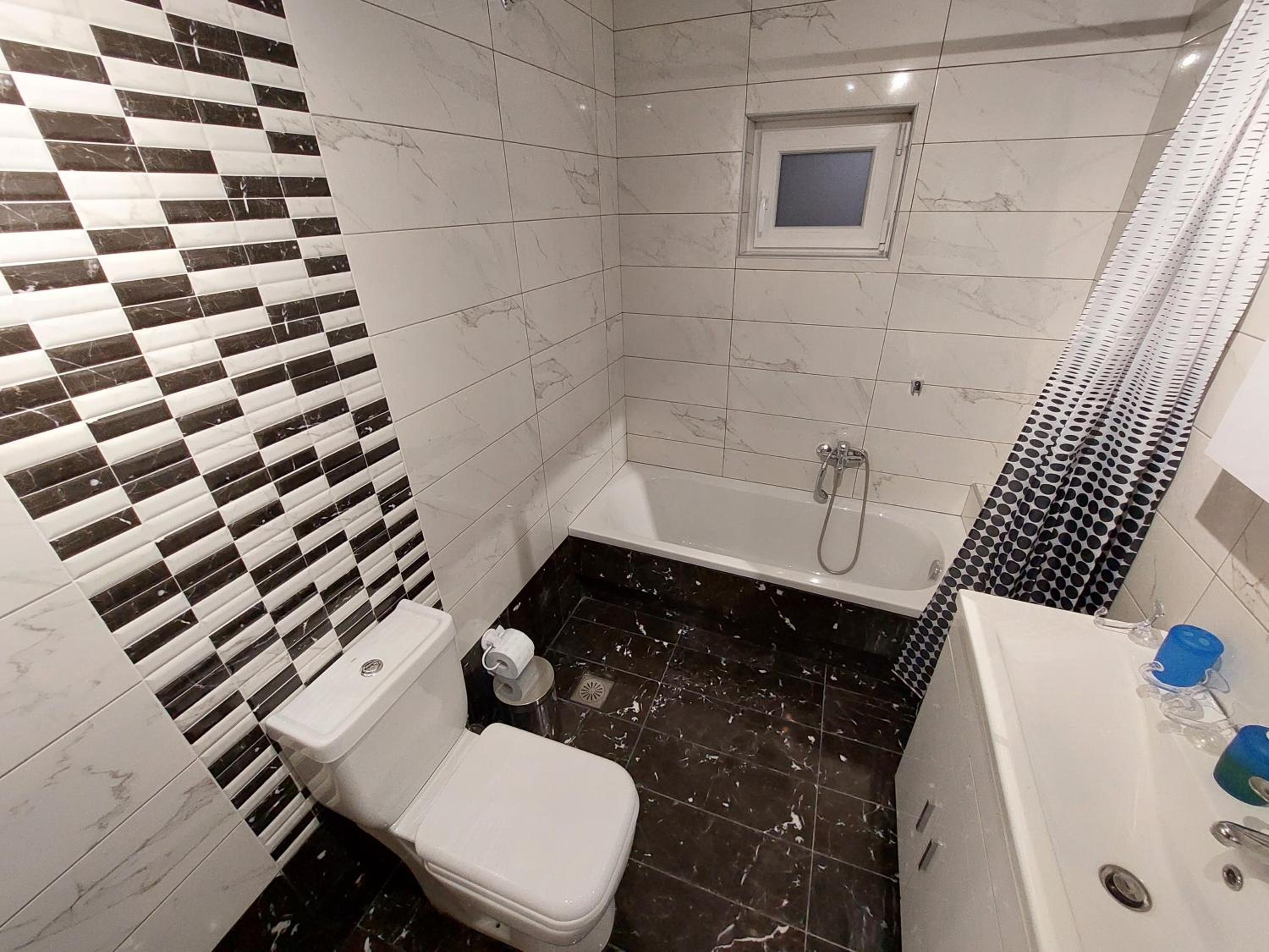 Two-Bedroom Apartment - Photo 34