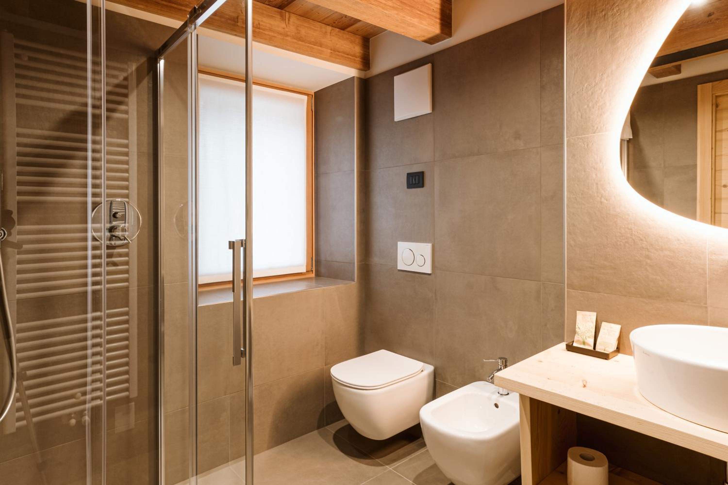 Deluxe Triple Room - Photo 12