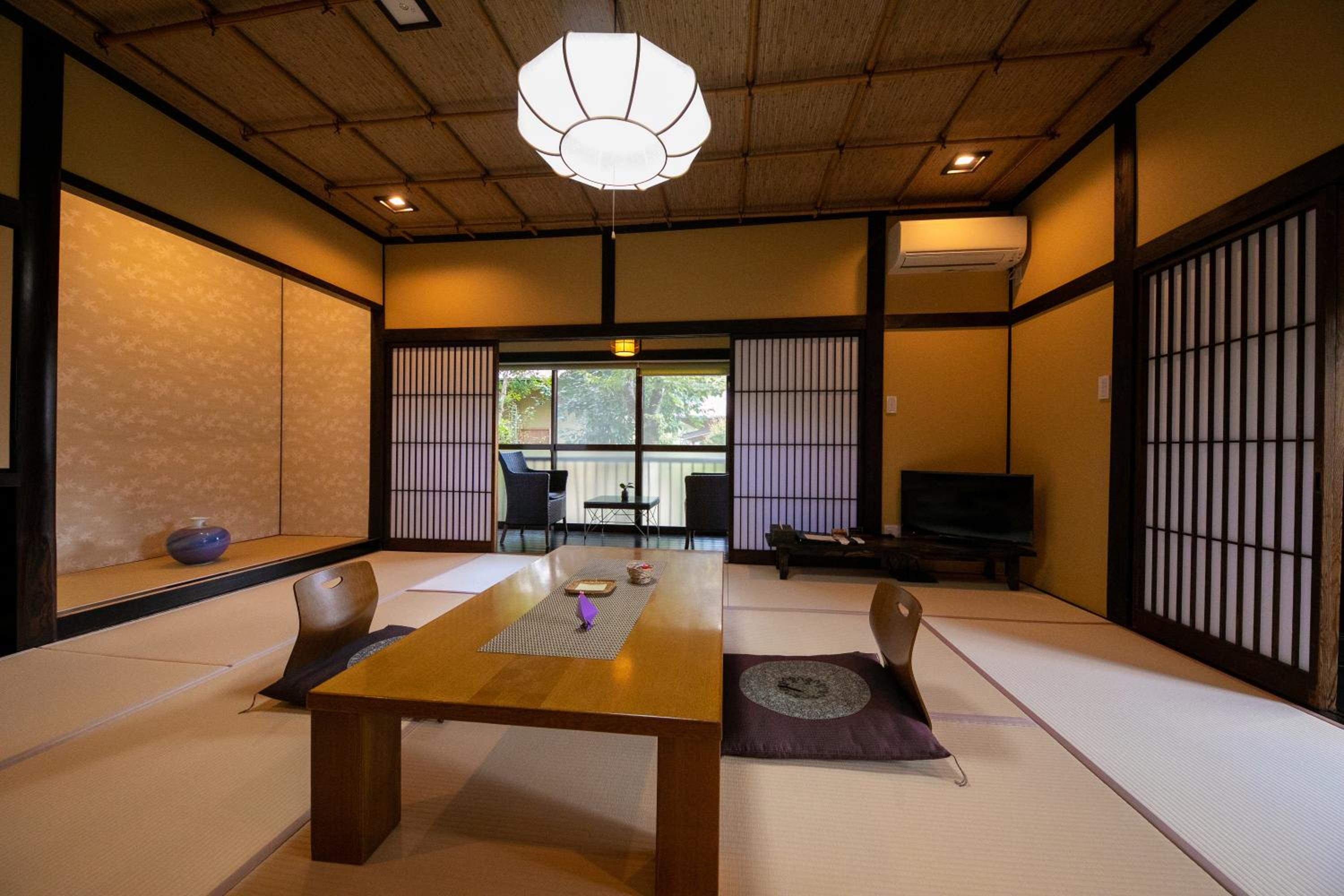Deluxe Room with Bed Room with large Open-Air Bath and Indoor Bath photo 1