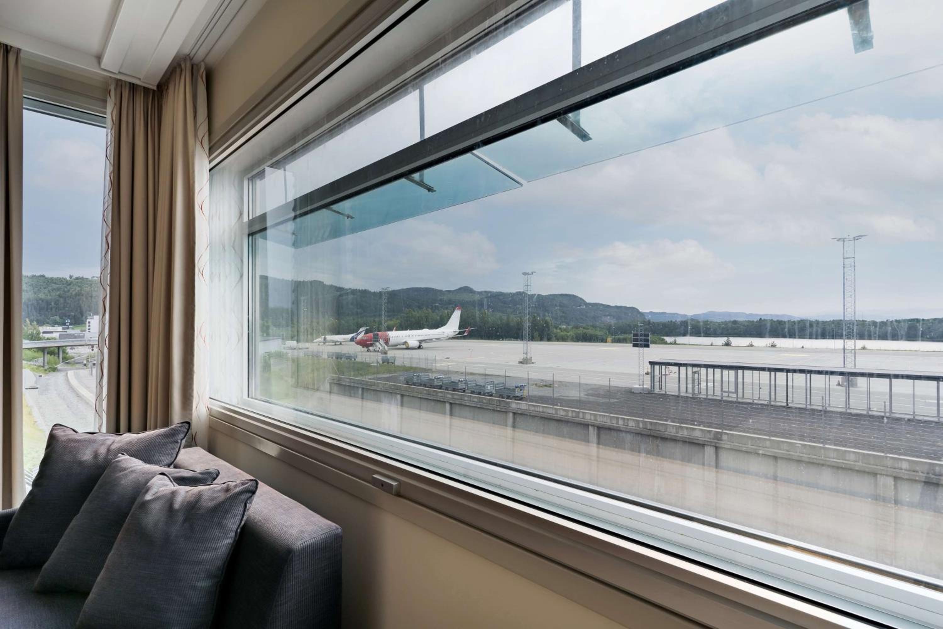 Family Room with Fjord and Runway View photo 2