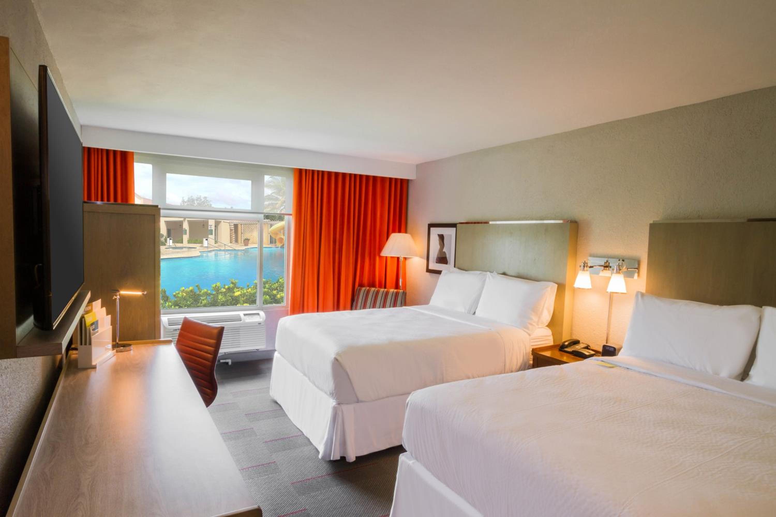 Deluxe Pool View Room, 2 Queen Beds - Photo 1