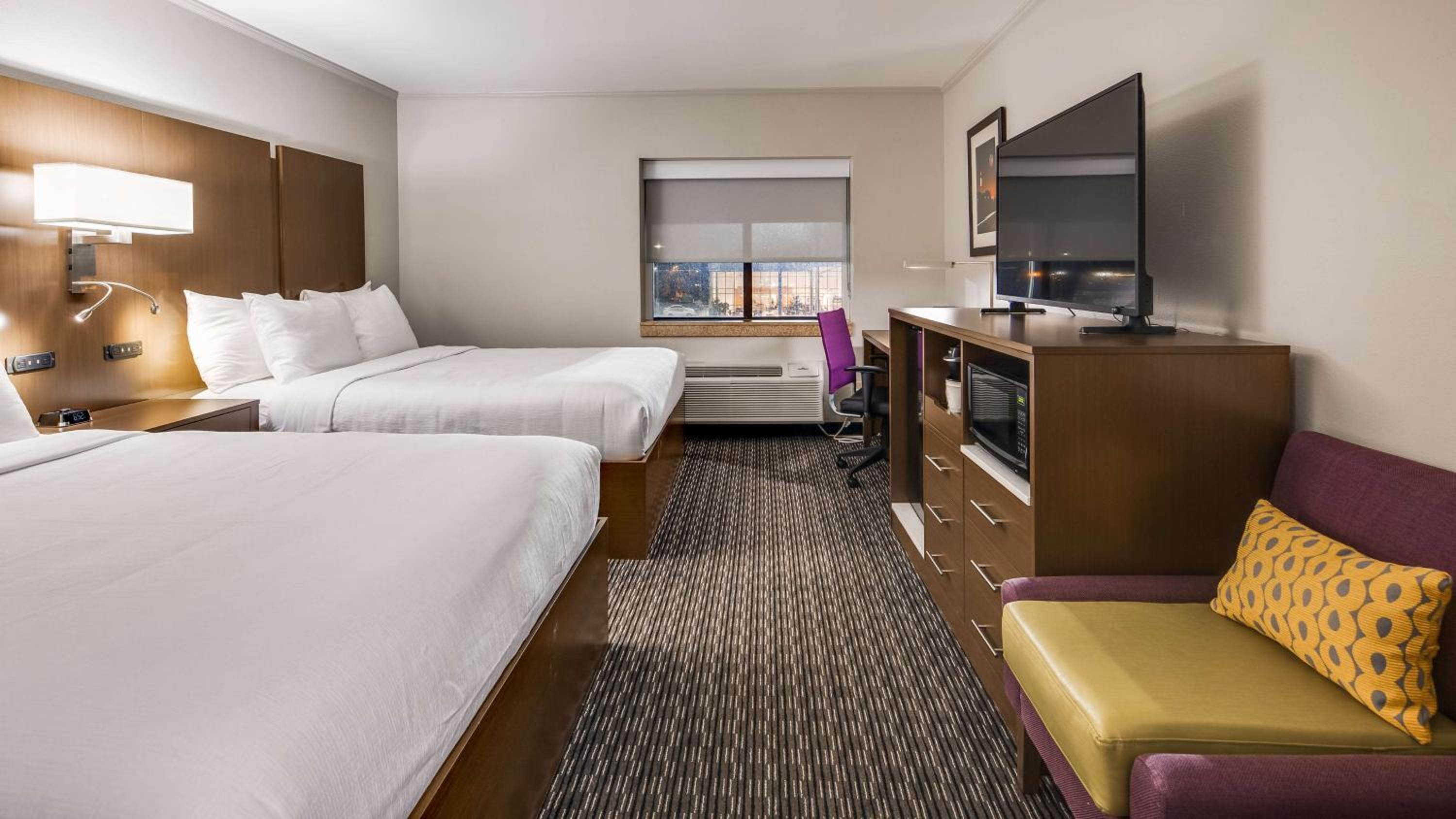 Queen Room with Two Queen Beds - Photo 1