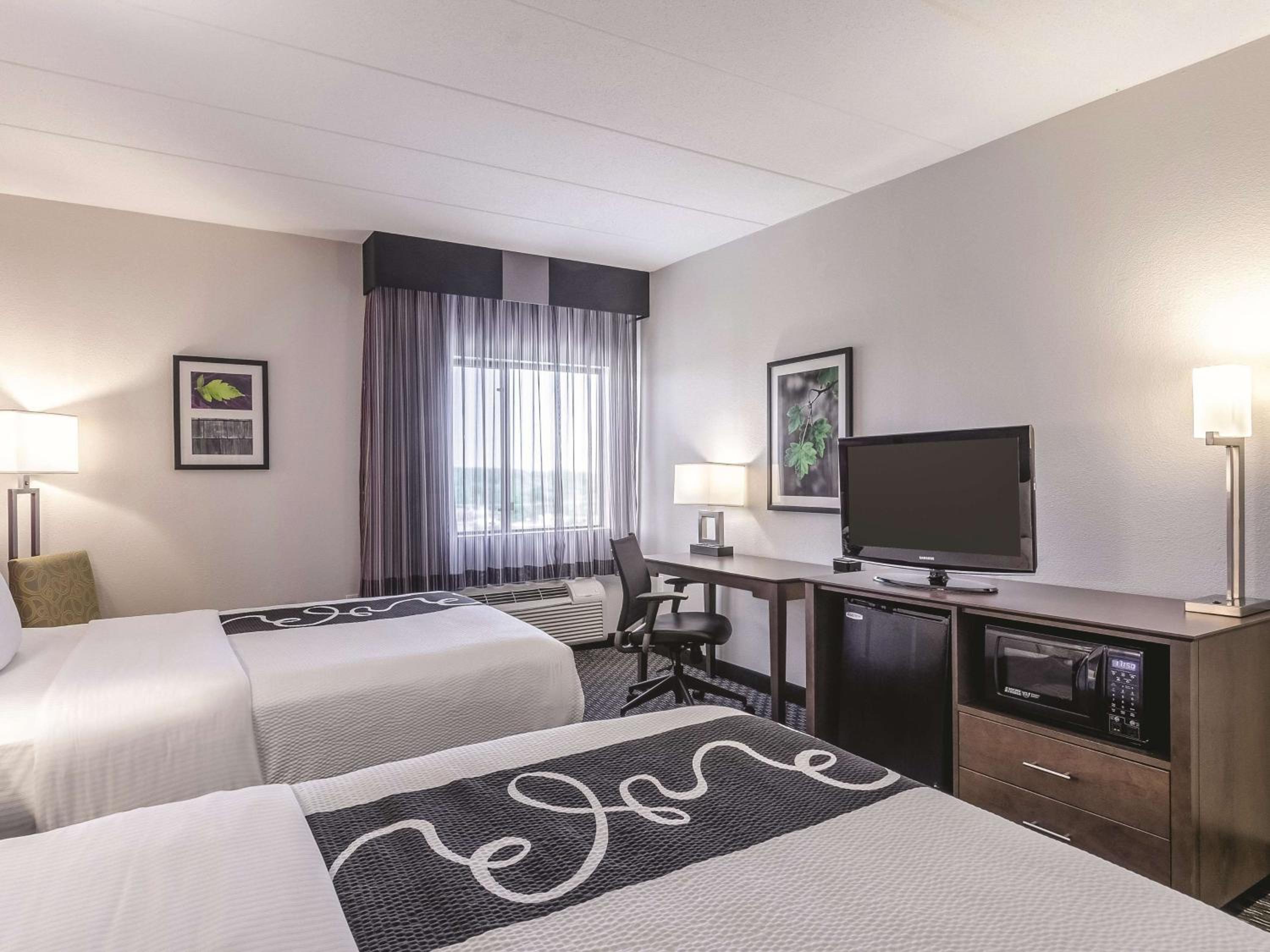 Deluxe Queen Room with Two Queen Beds - Photo 1