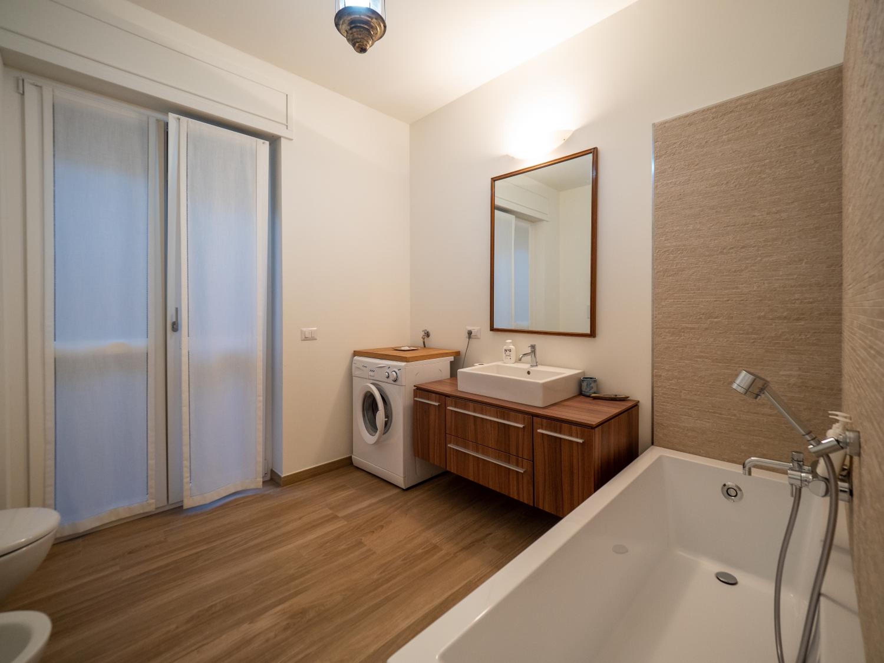 Three-Bedroom Apartment - Photo 40