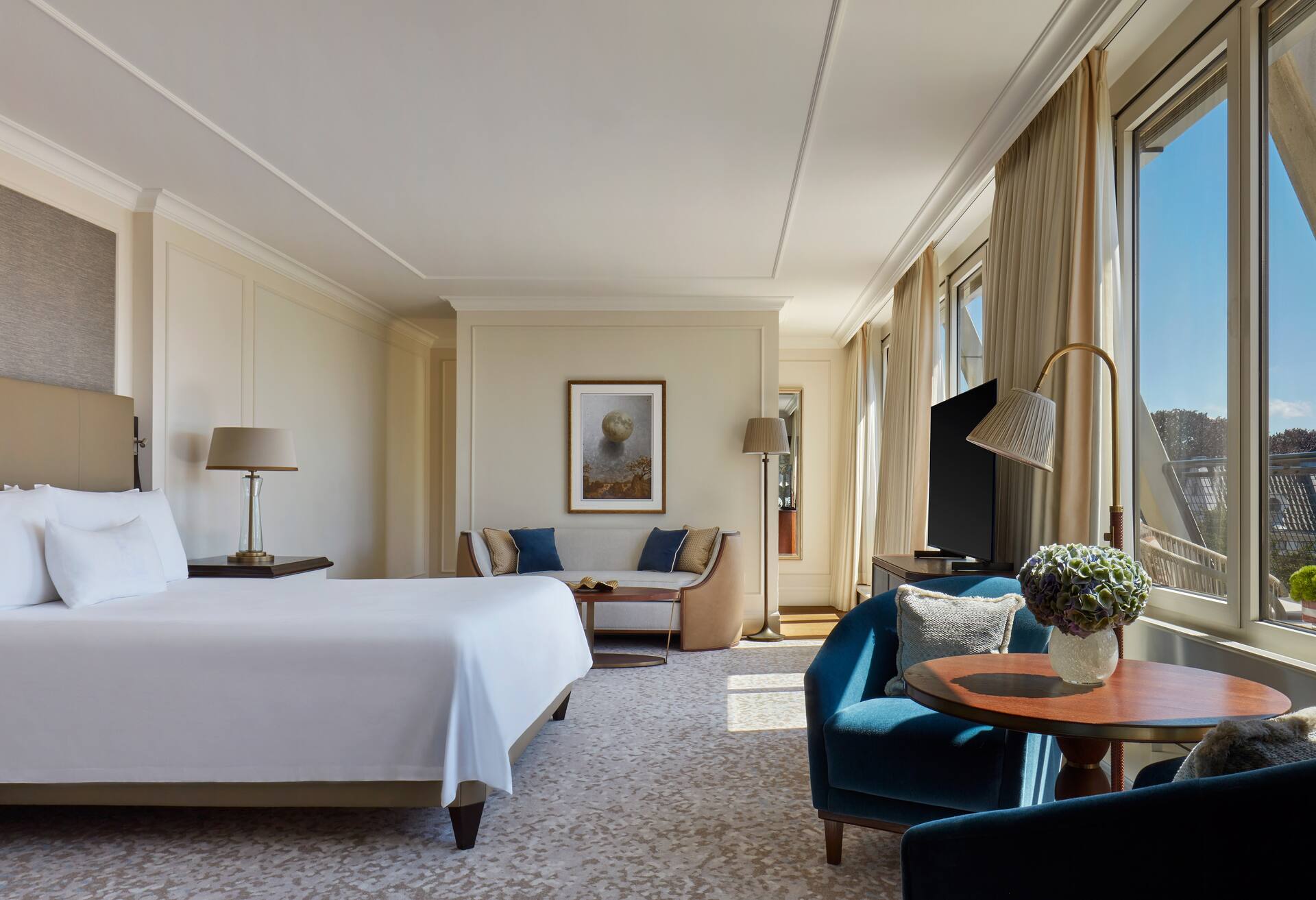 Junior Suite with Balcony- City Garden Views