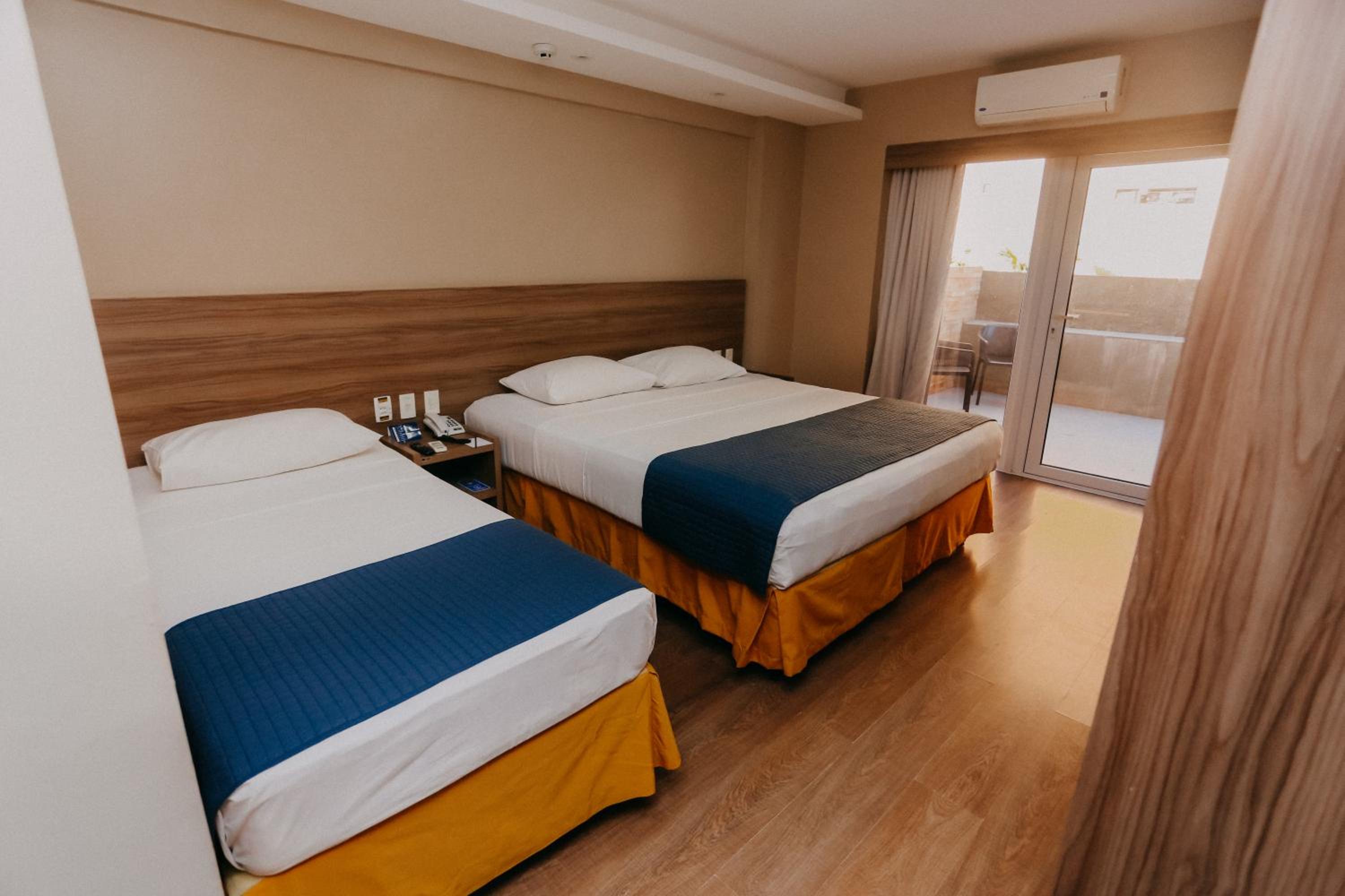 Triple Room - Photo 1