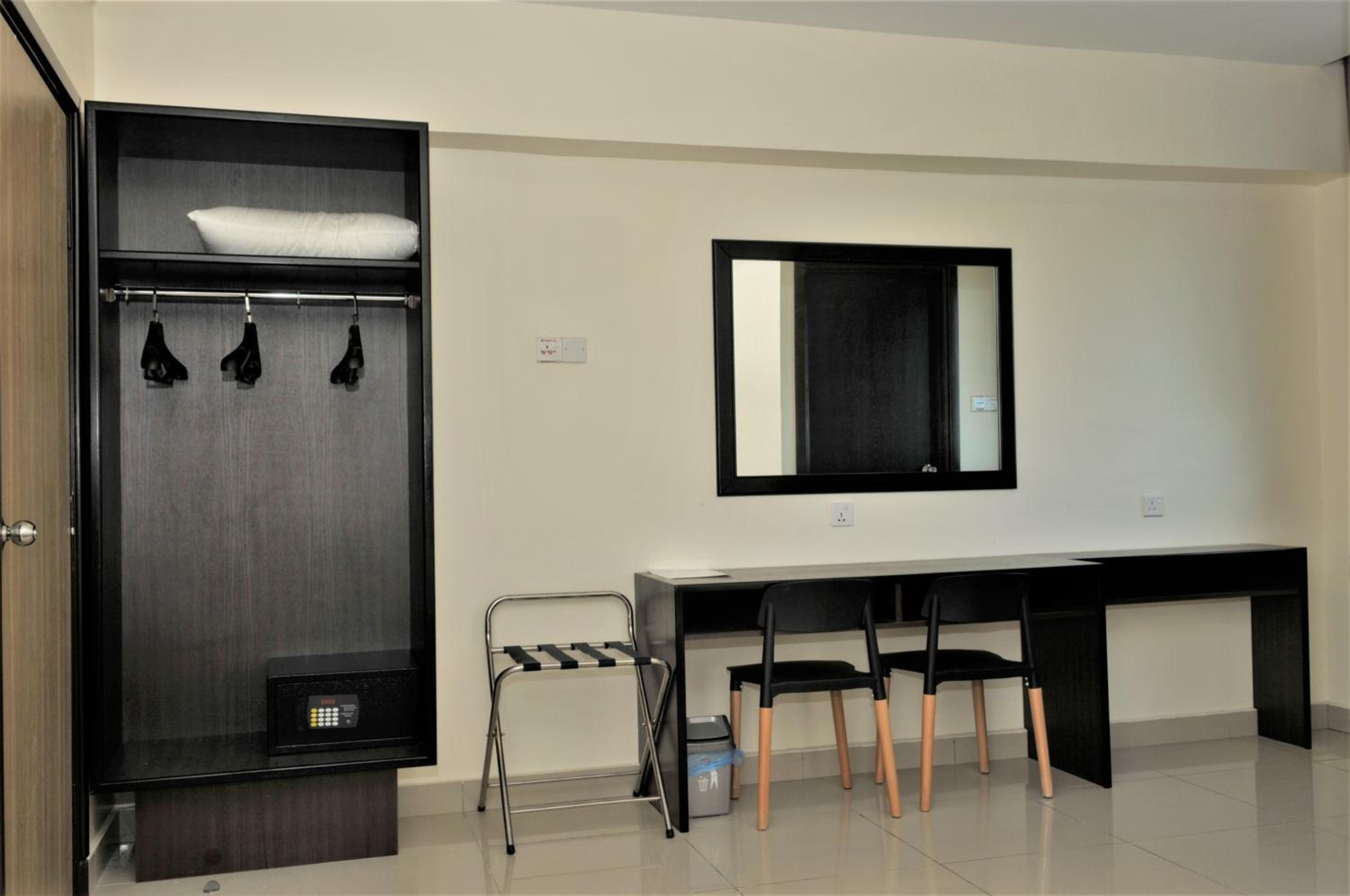 Three-Bedroom Apartment - Photo 40