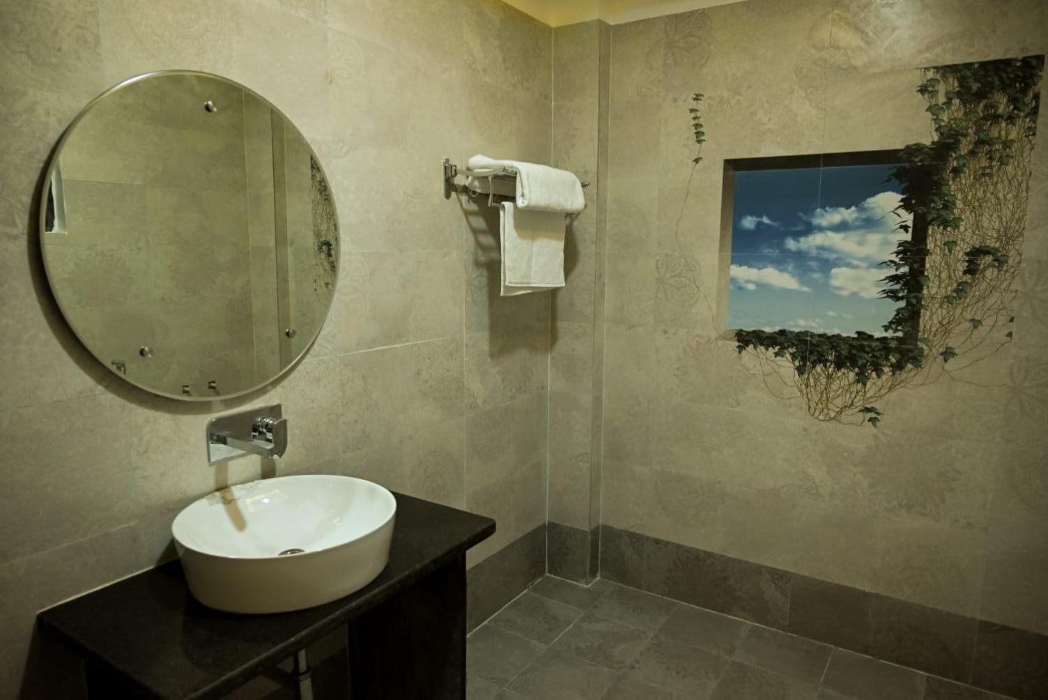 Deluxe Room - Photo 4