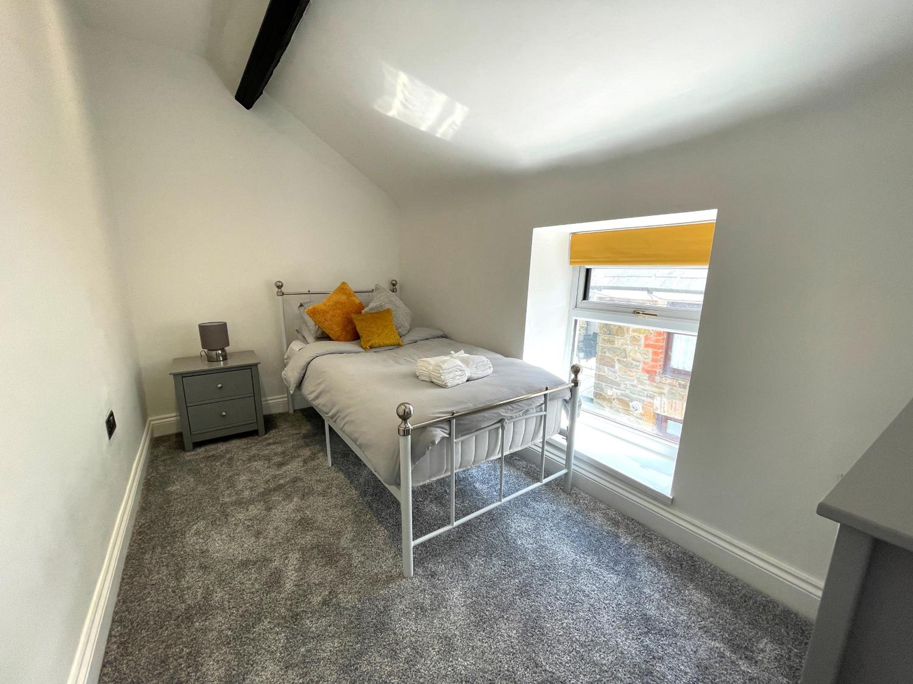 Three-Bedroom House - Photo 4