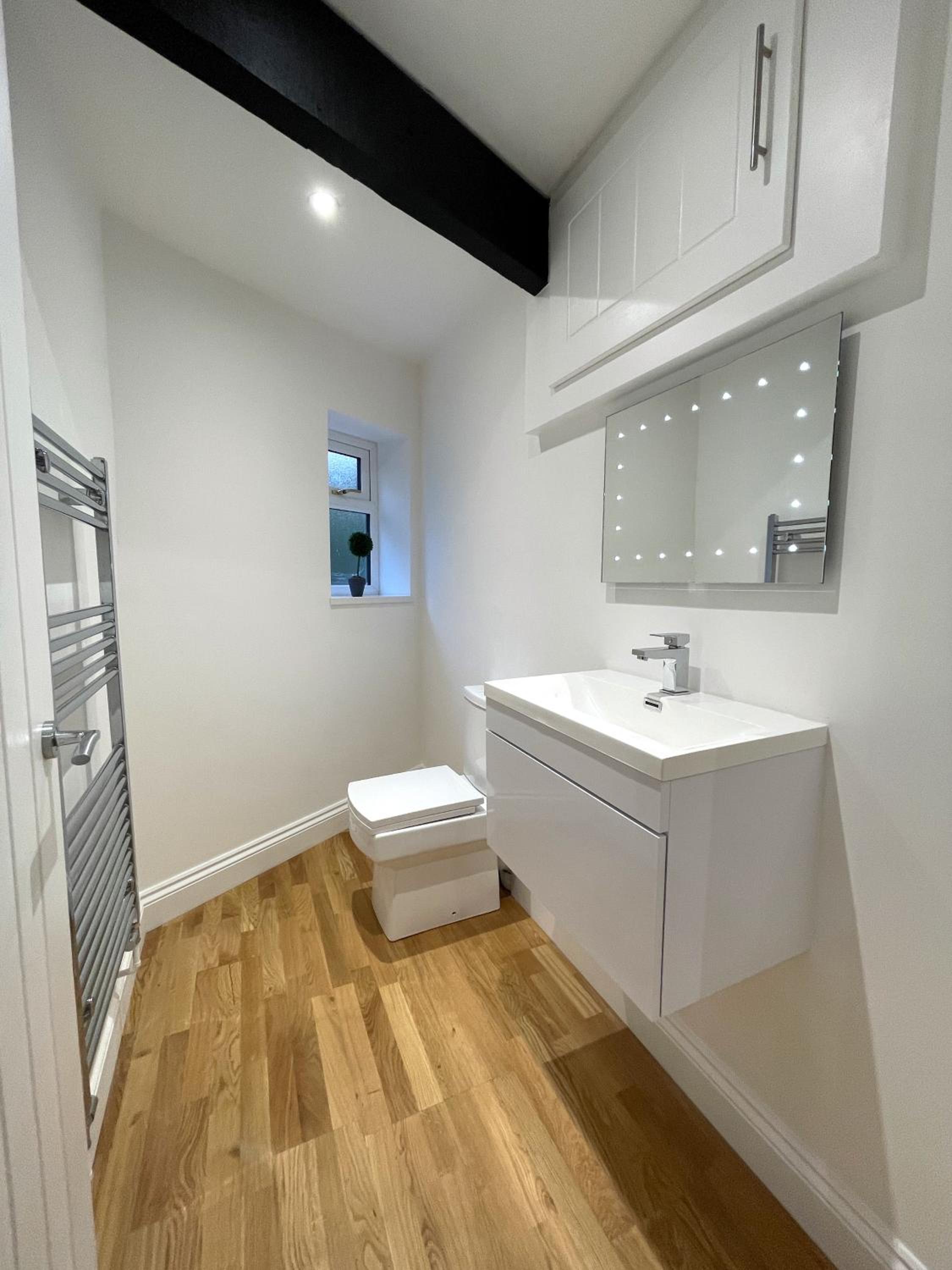 Three-Bedroom House - Photo 14