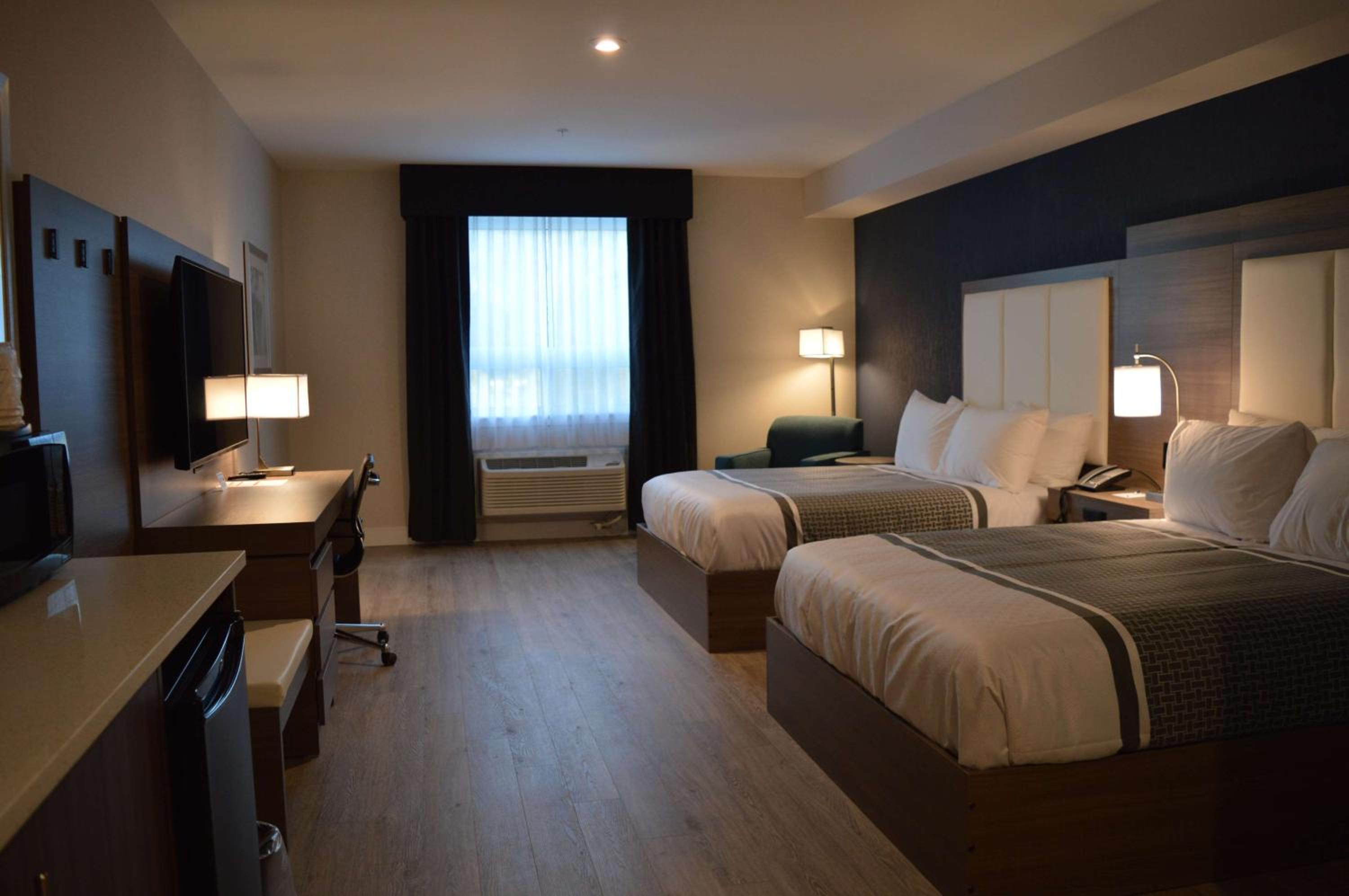 Queen Room with Two Queen Beds - Photo 1