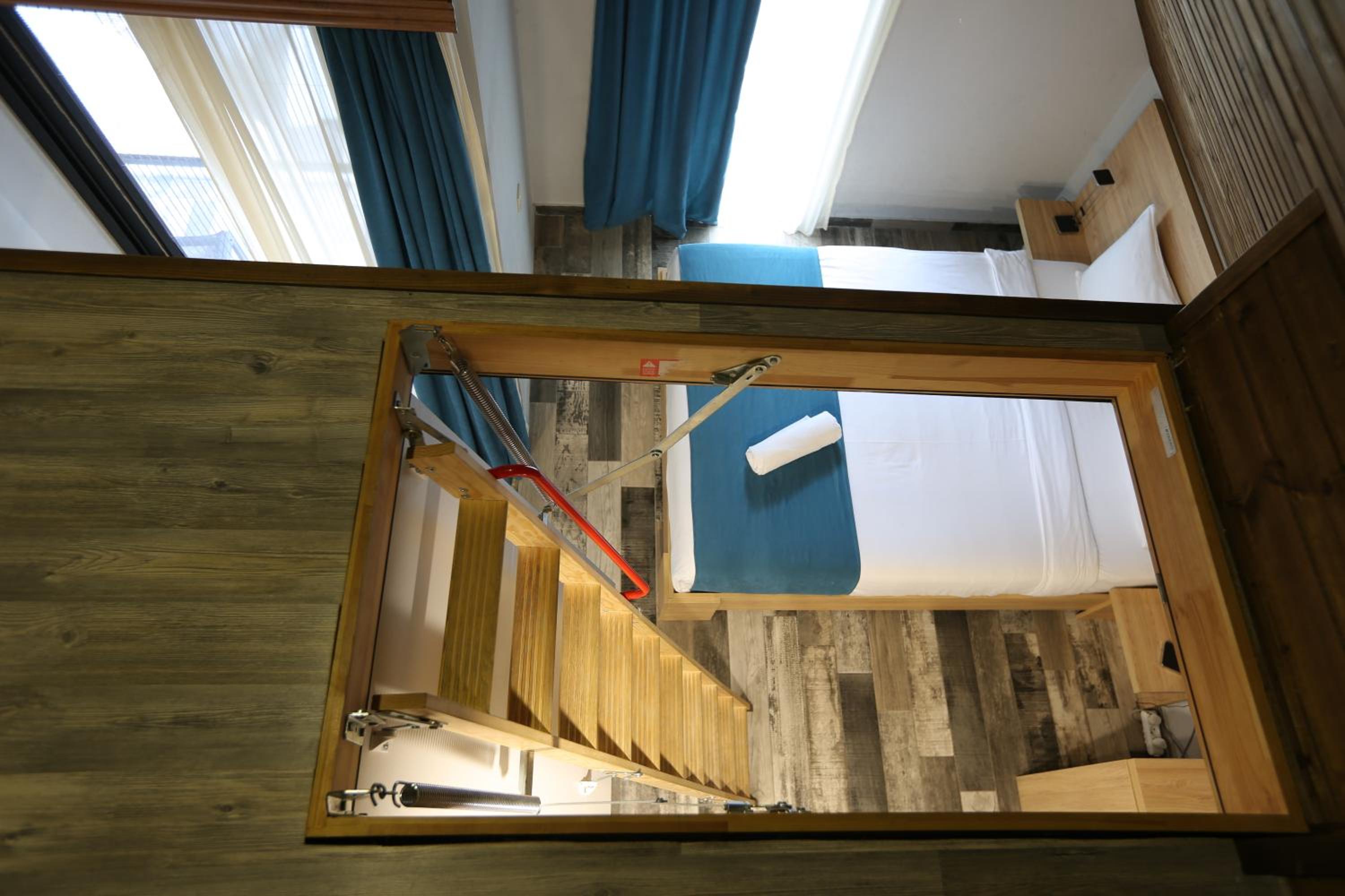 Quadruple Room with Balcony - Photo 36