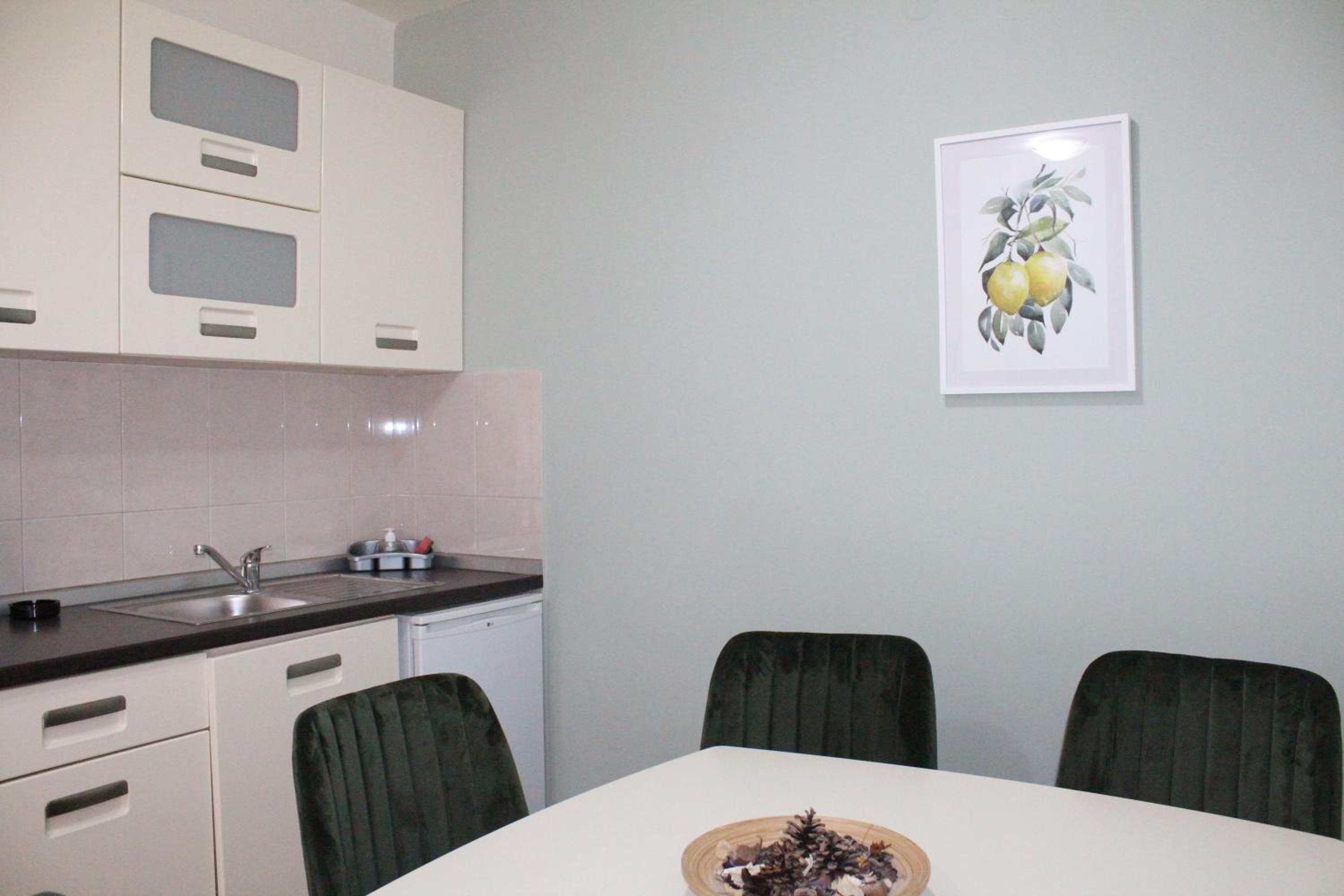Apartment with Balcony - Photo 11