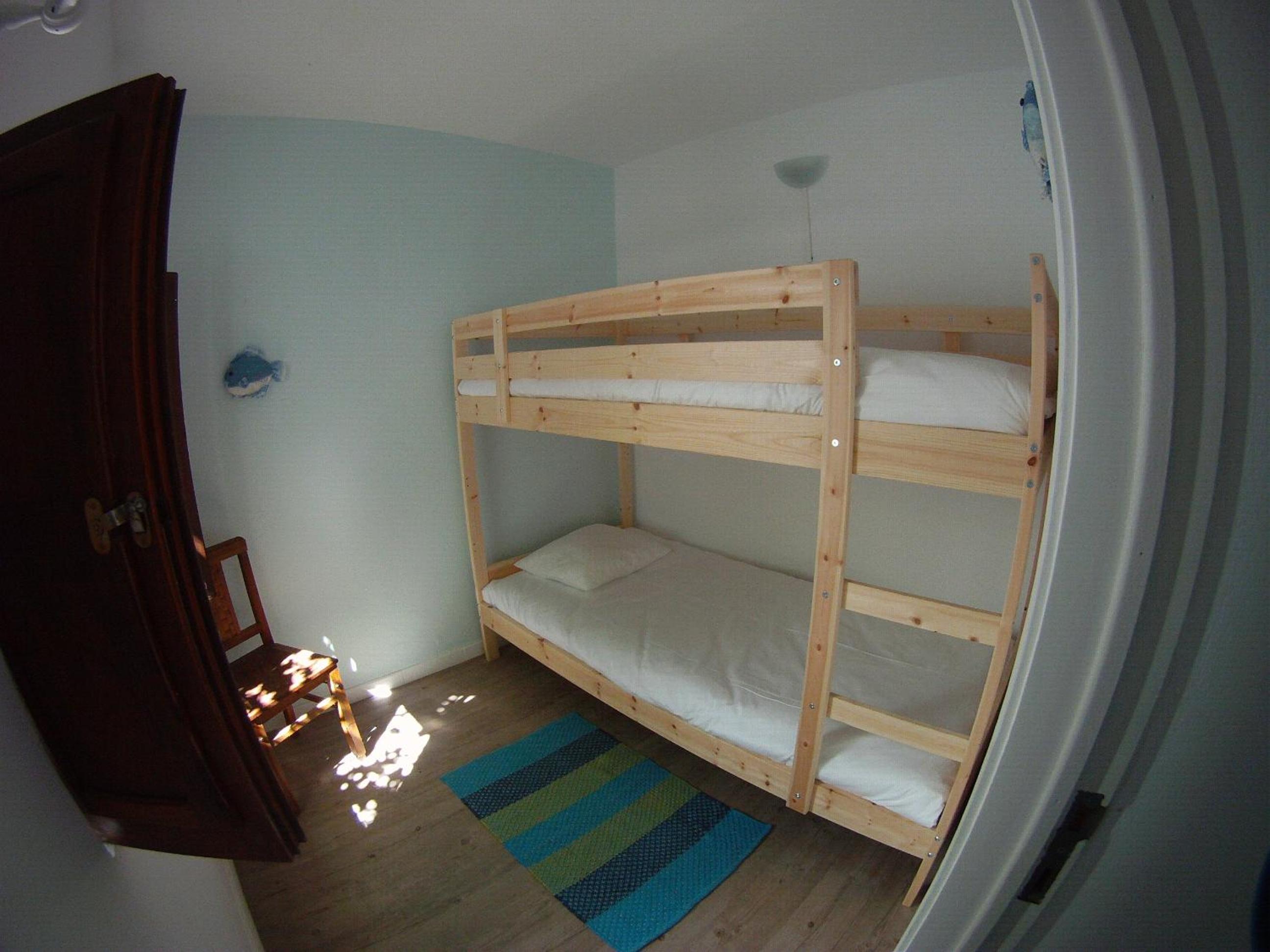 Single Bed in Dormitory Room