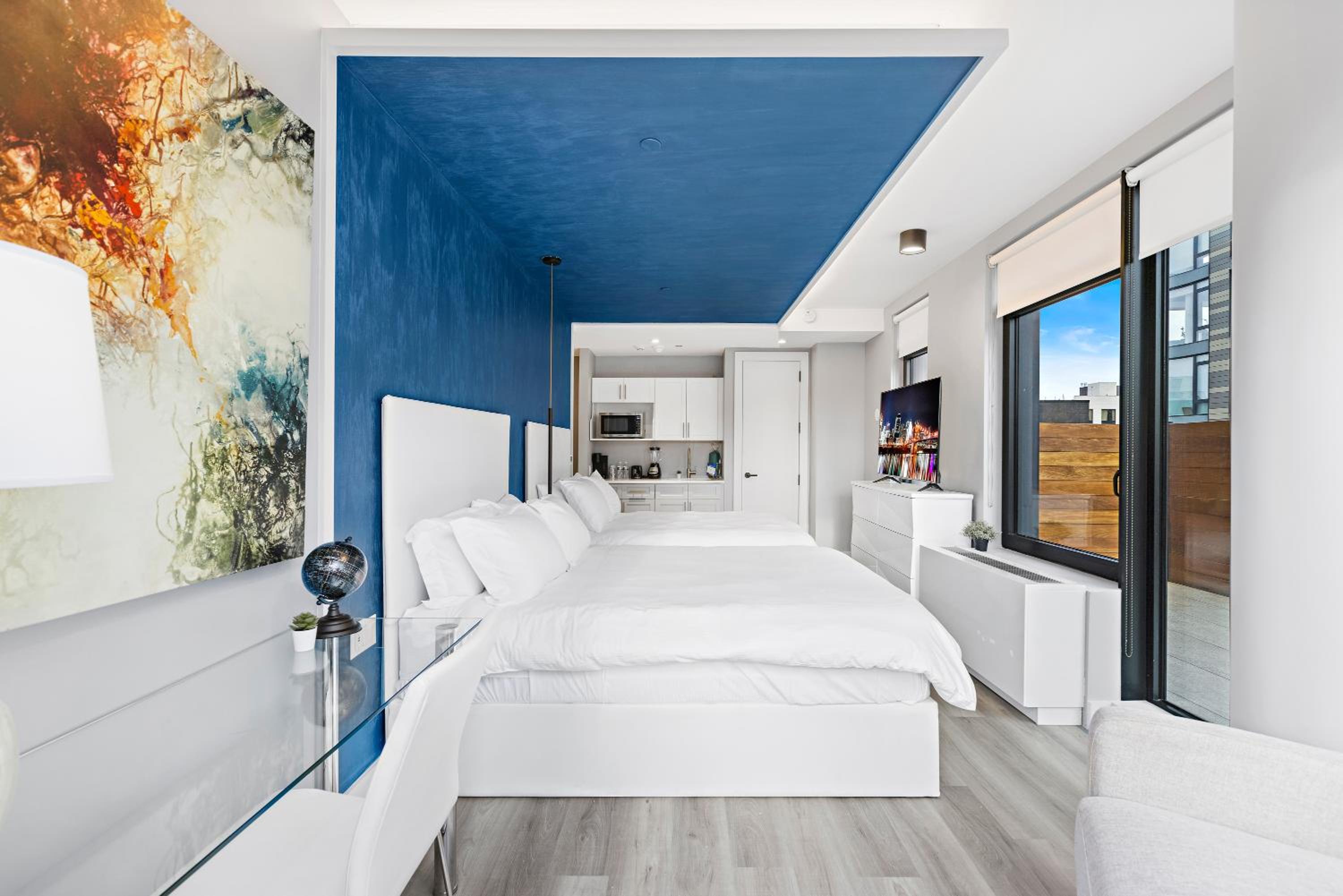 Deluxe Queen Suite with Two Queen Beds, Balcony, Non-Smoking - Photo 1