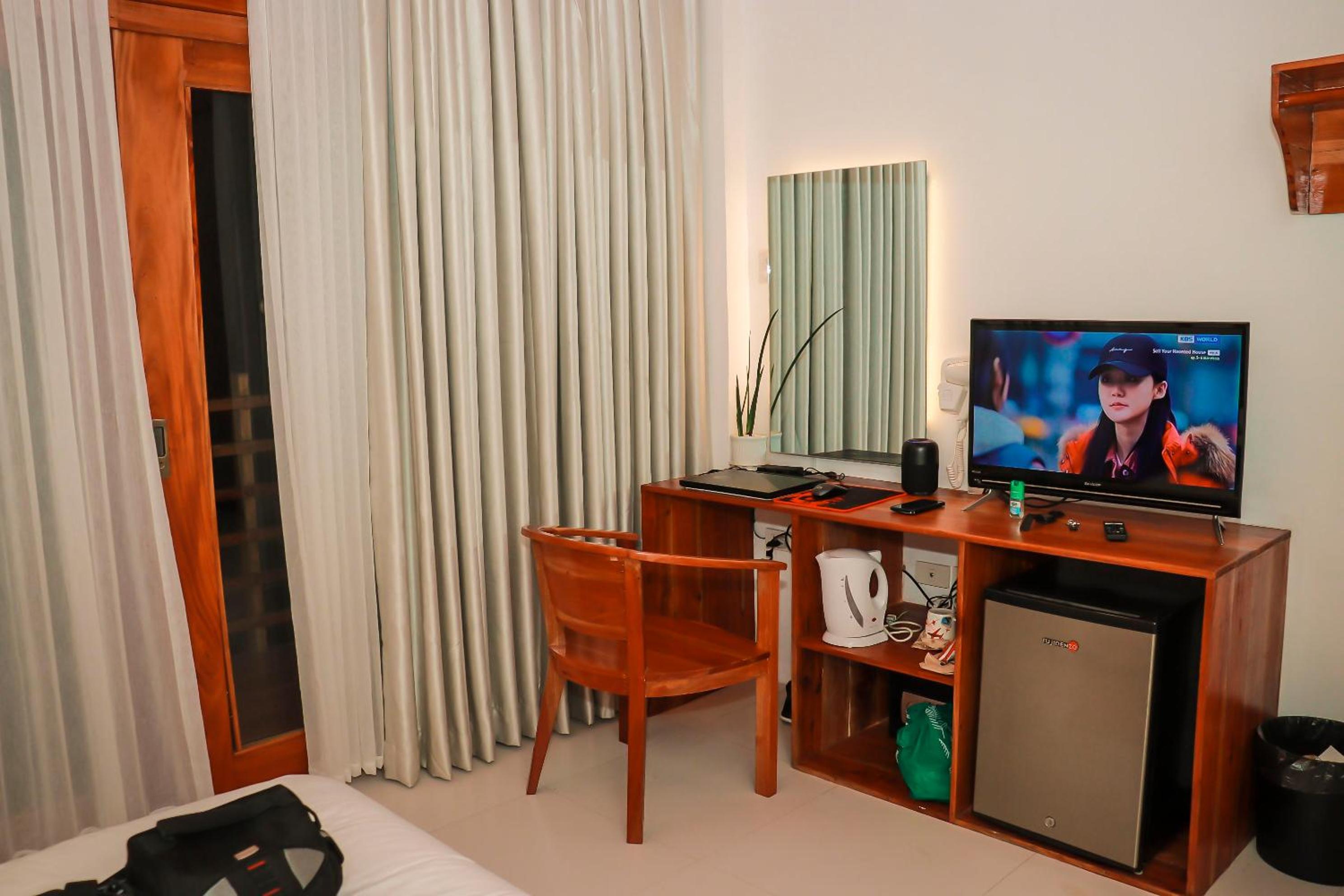 Deluxe Room - Photo 8