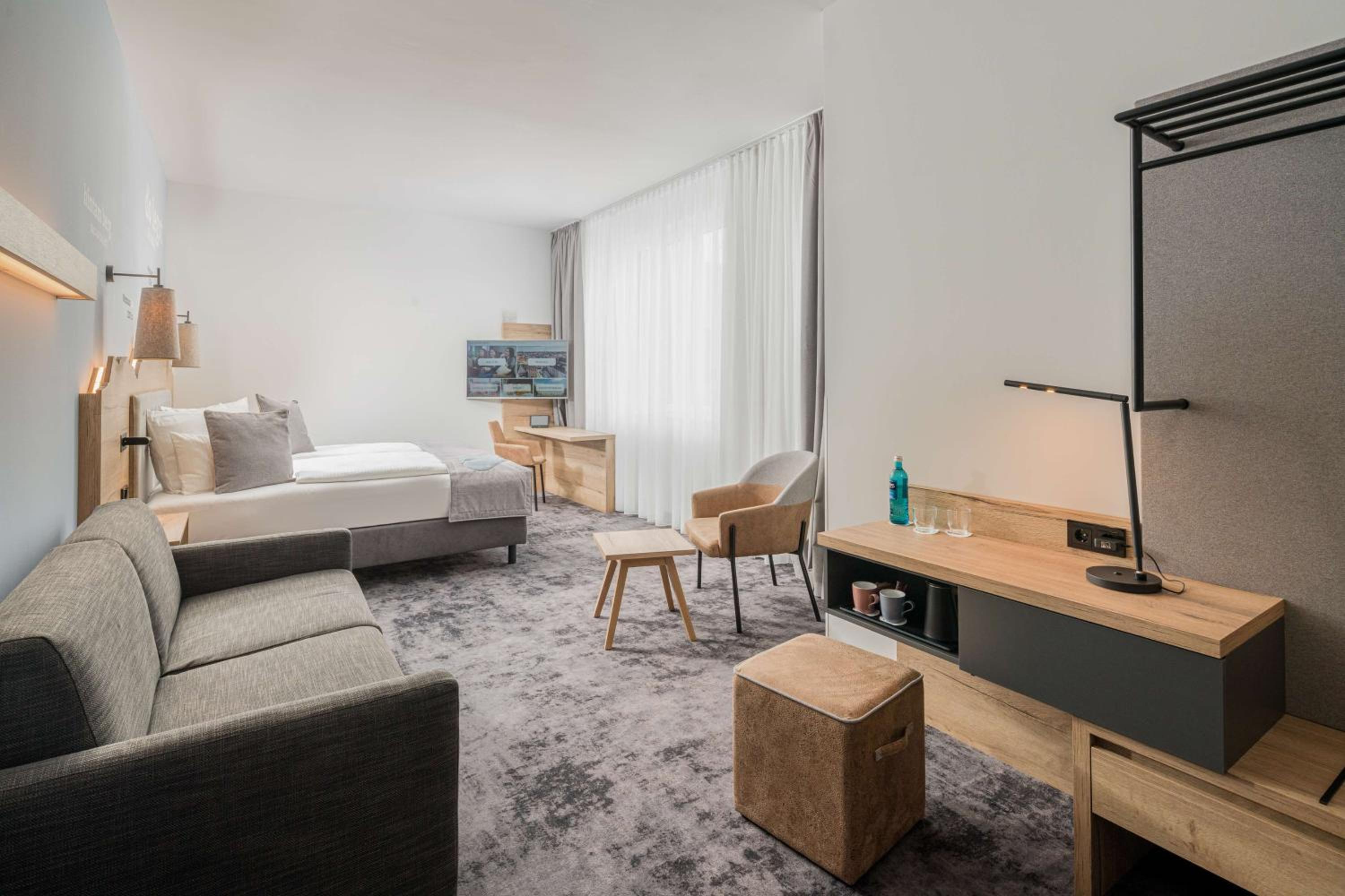 Junior Suite with Walk-In Shower and Sofa Bed