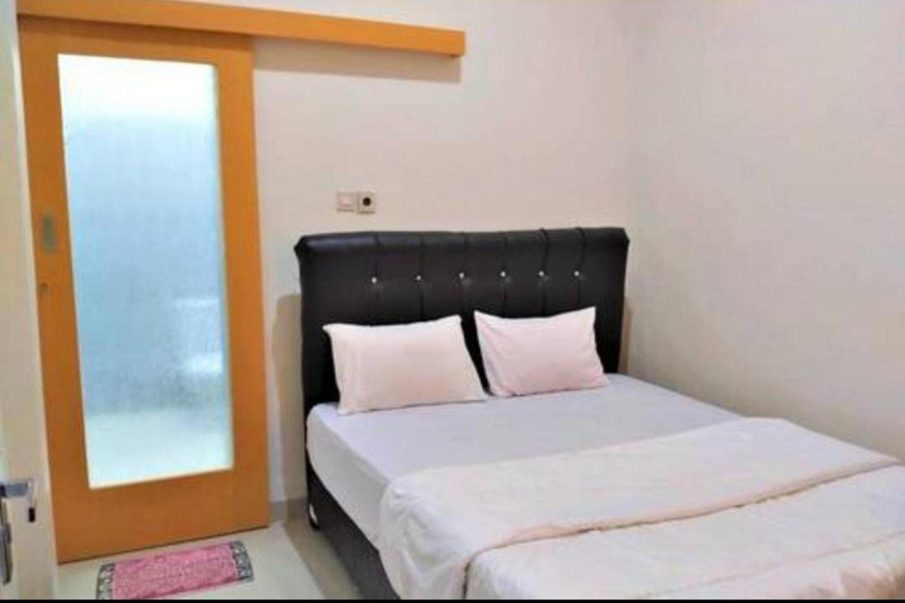 Deluxe Room - Photo 6