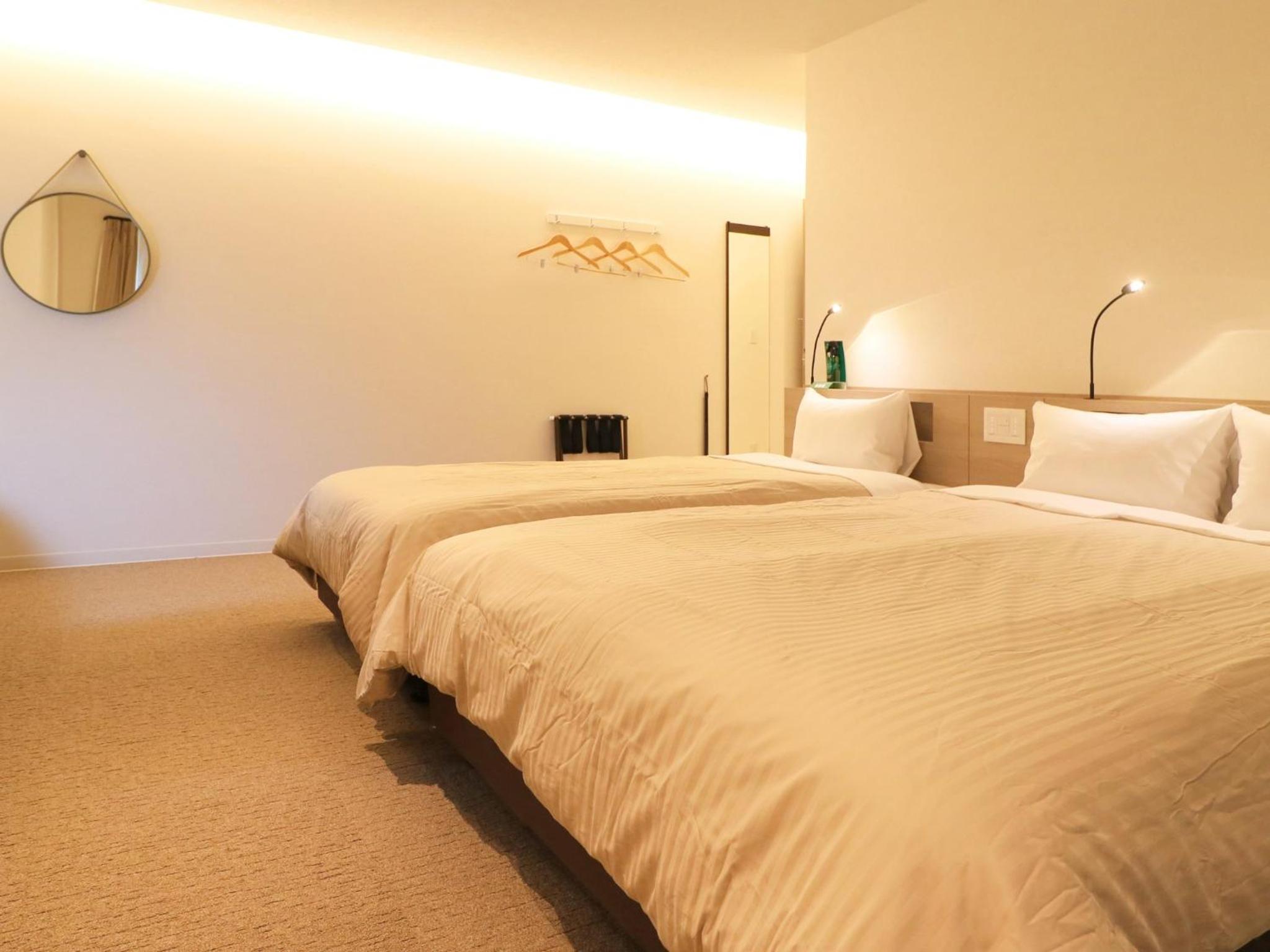 Deluxe Triple Room - Photo 12