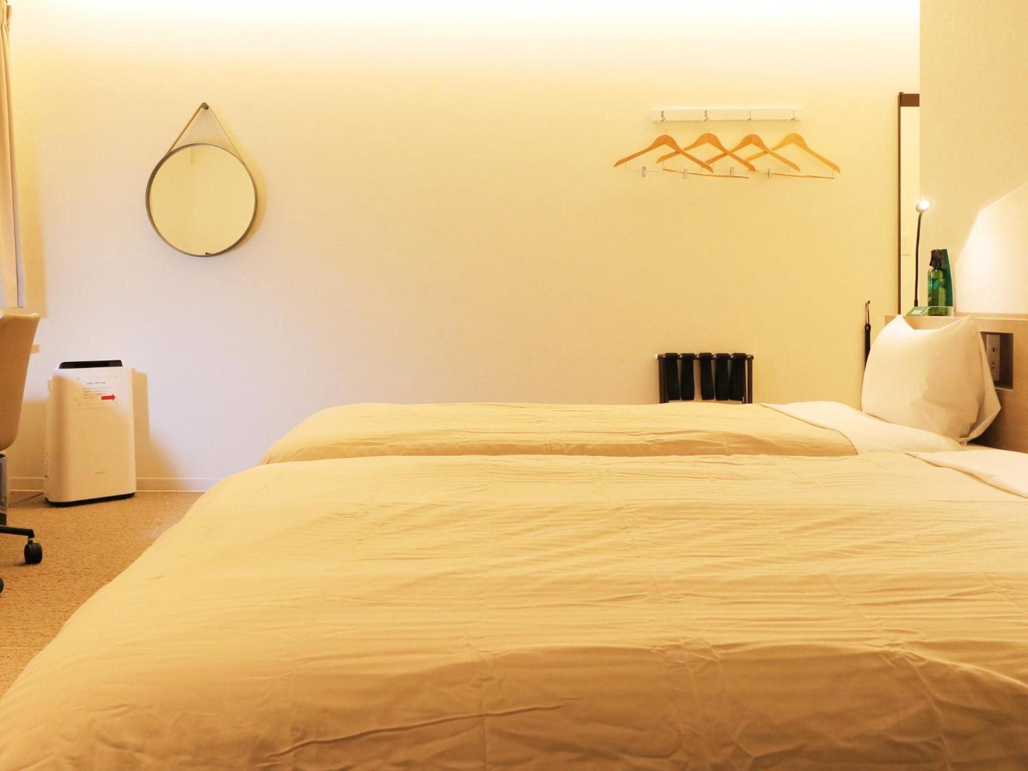 Deluxe Triple Room - Photo 13