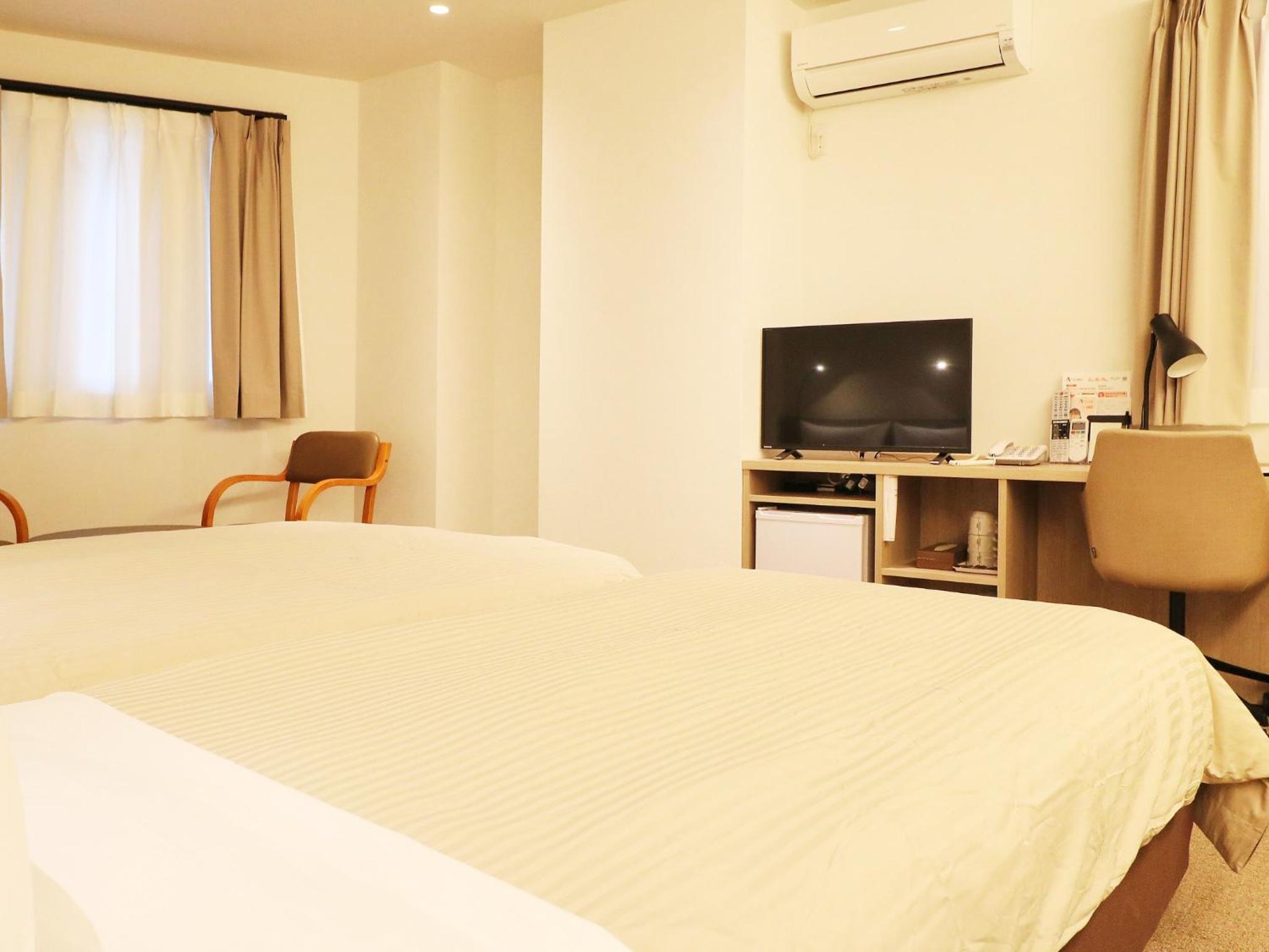 Deluxe Triple Room - Photo 23