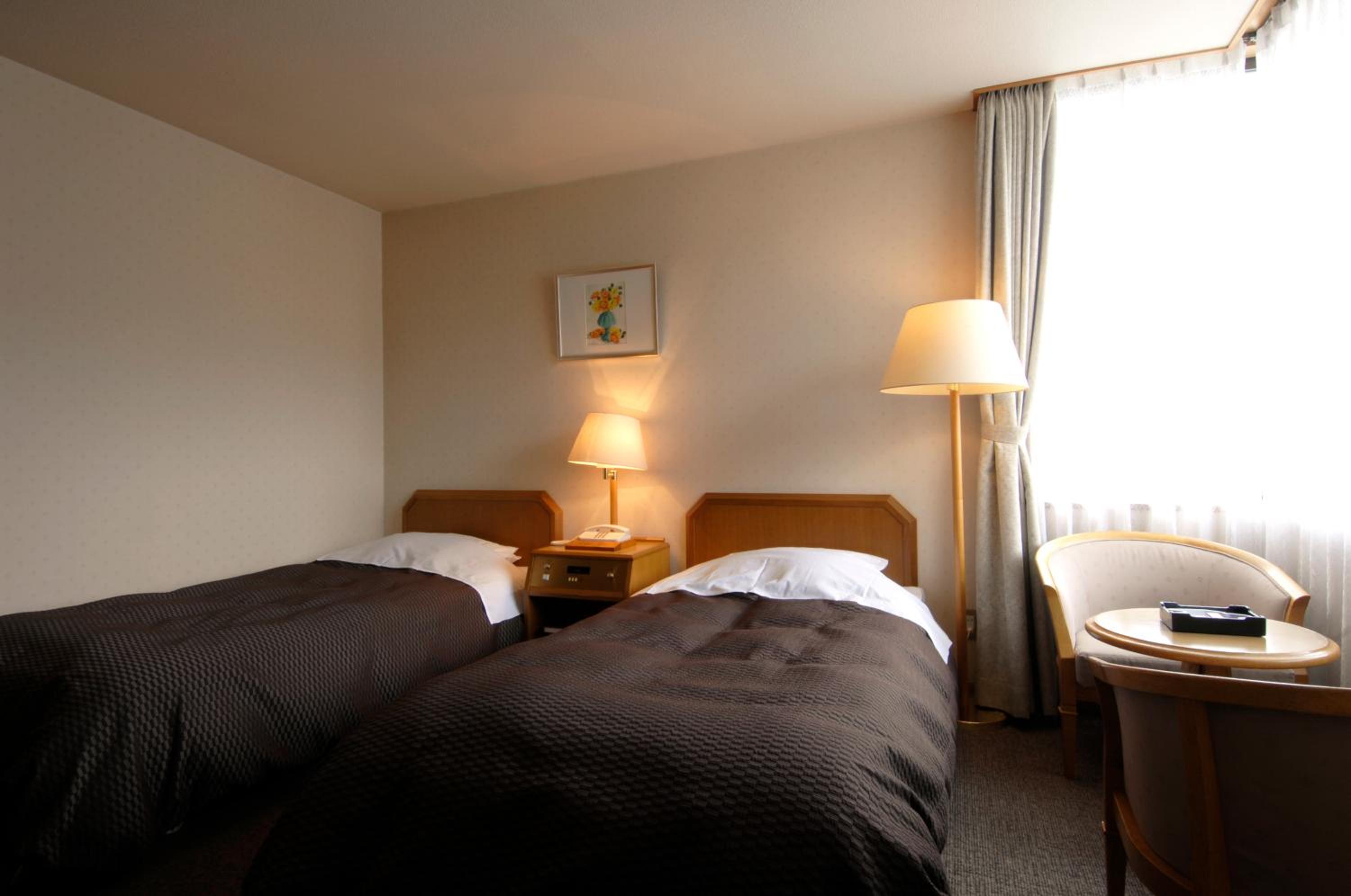 Twin Room - Photo 2