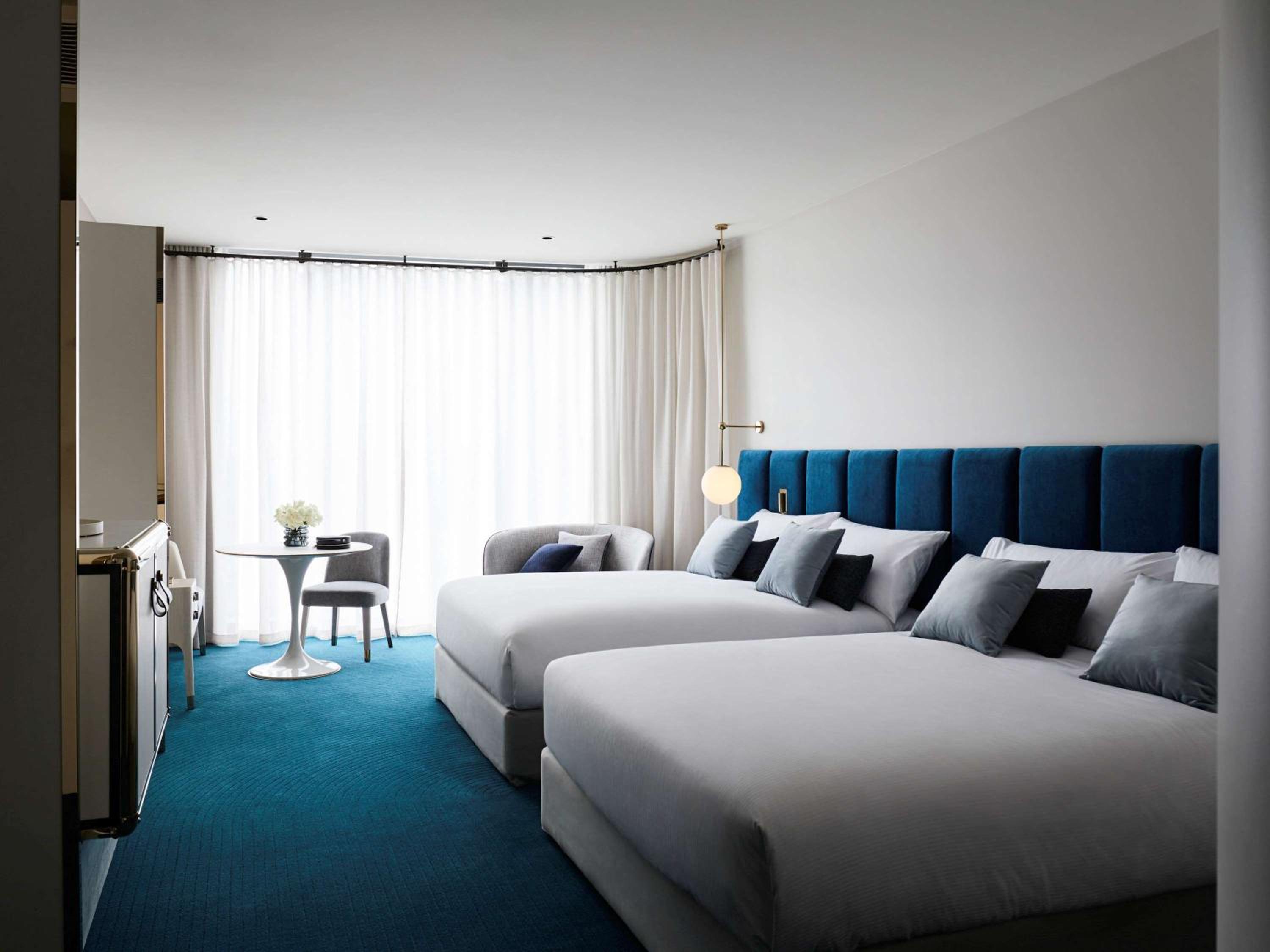 Superior Queen Room with Two Queen Beds - Photo 1